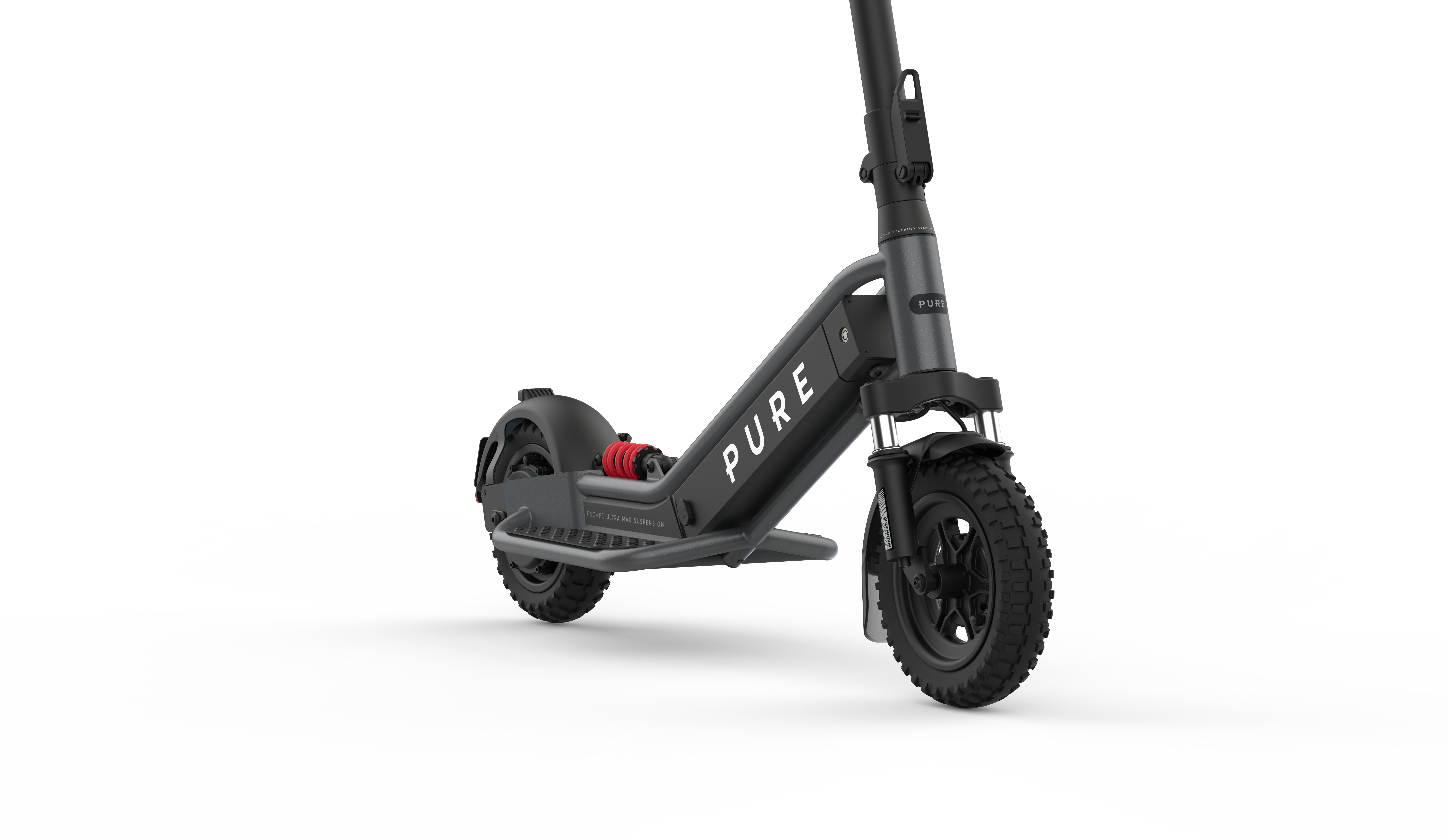 Ein dunkler E-Scooter mit grobstolligen Reifen und roter Federung.