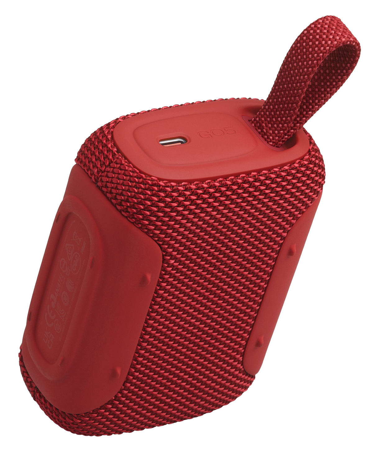 Czerwony przenośny głośnik z tekstylną obudową i pętelką.