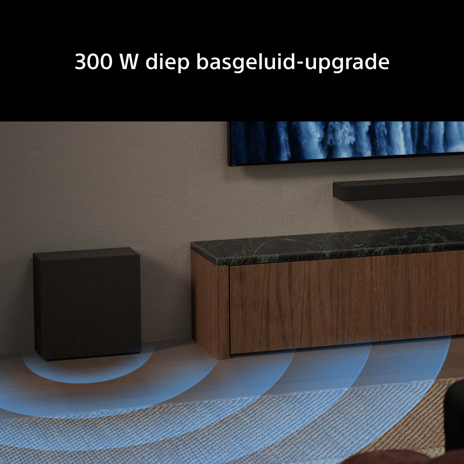 Black subwoofer next to a wooden cabinet; blue waves indicate sound.