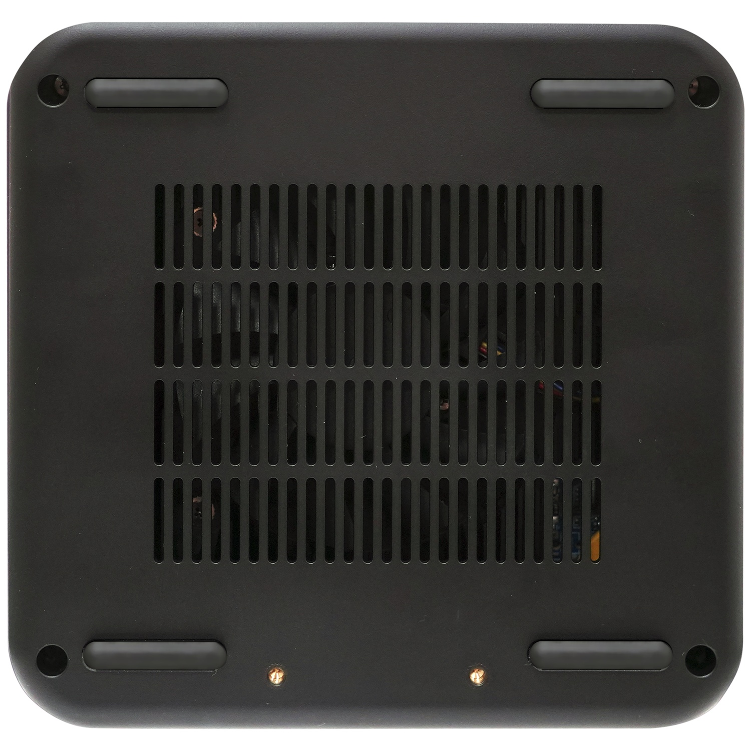 Bottom view of a black device with ventilation slots and rubber feet.