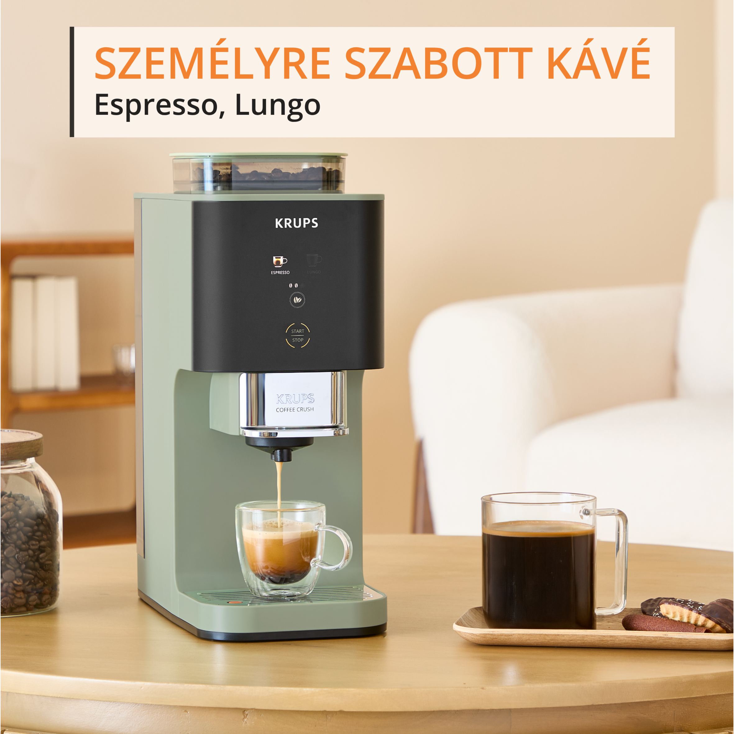 Zöld Krups kávéfőző eszpresszót főz egy dupla falú üvegpohárba.