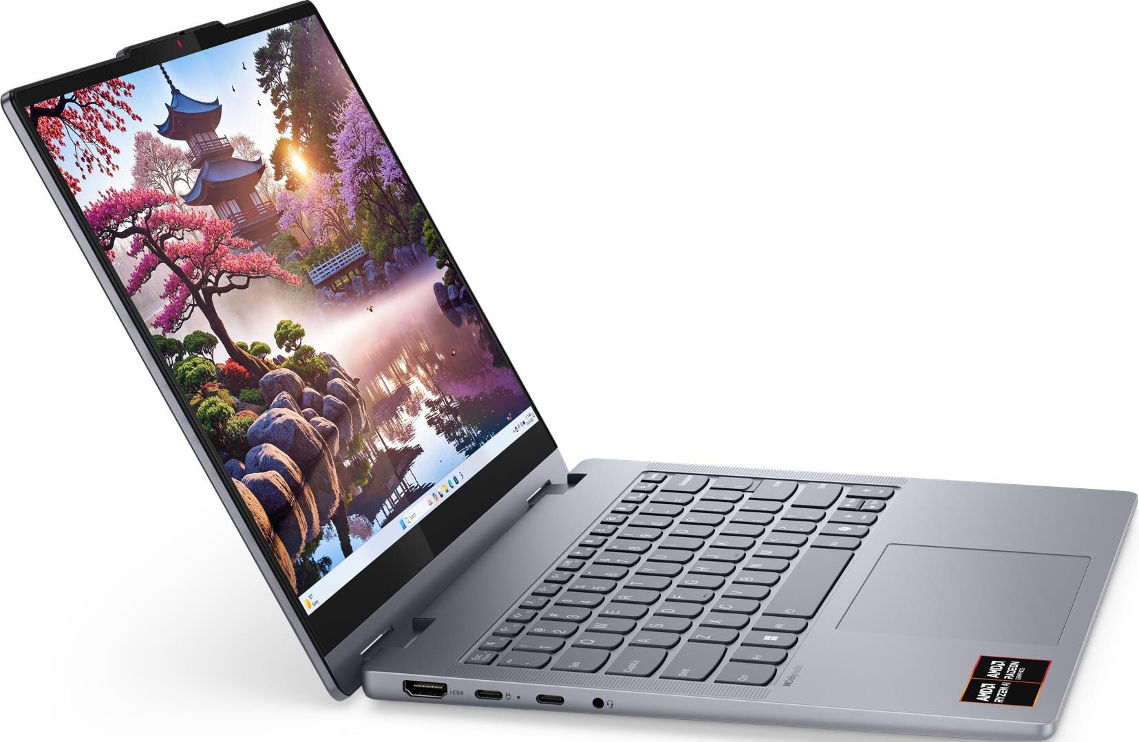 Ein offener Laptop mit einem Bild eines japanischen Gartens auf dem Bildschirm.