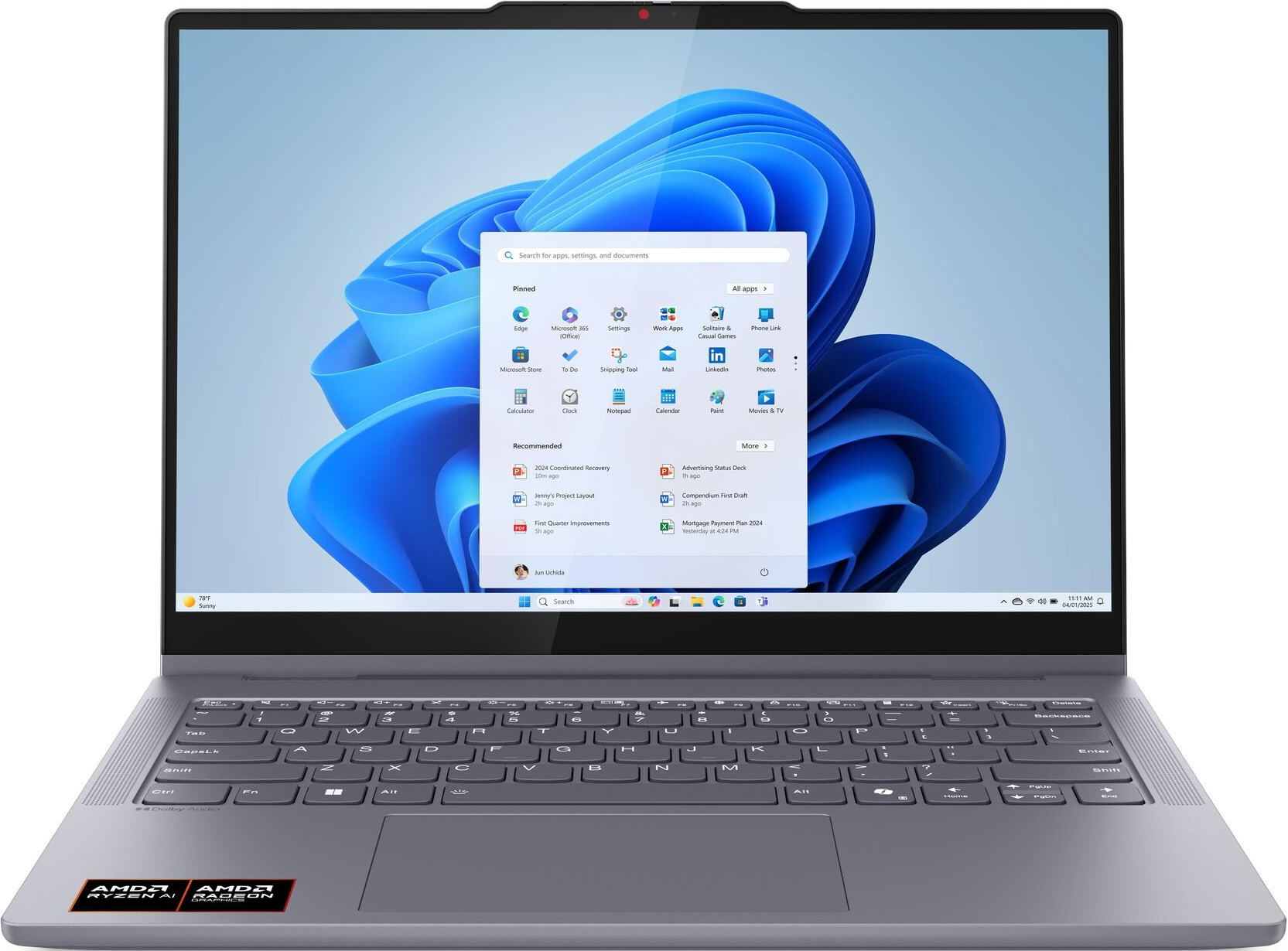Ein Laptop mit Windows 11 Startmenü, das geöffnete Apps anzeigt.