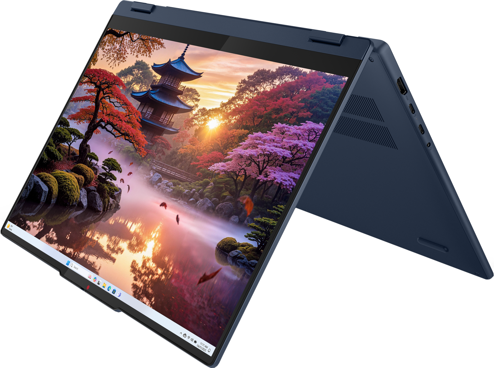 Ein blauer Laptop zeigt ein Bild eines japanischen Gartens mit einem Pagodenturm und Herbstlaub.