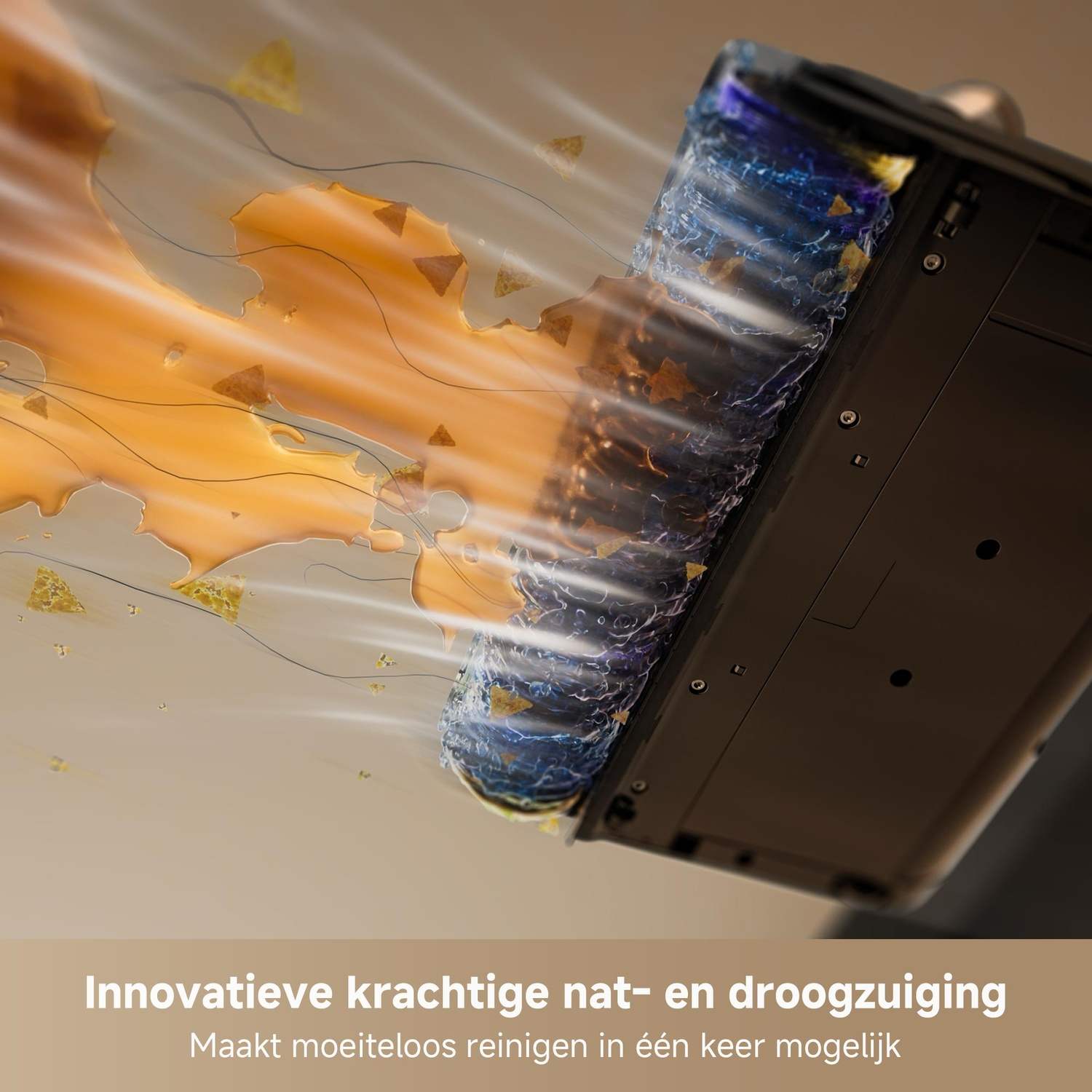 A rotating brush head vacuums orange liquid and crumbs.