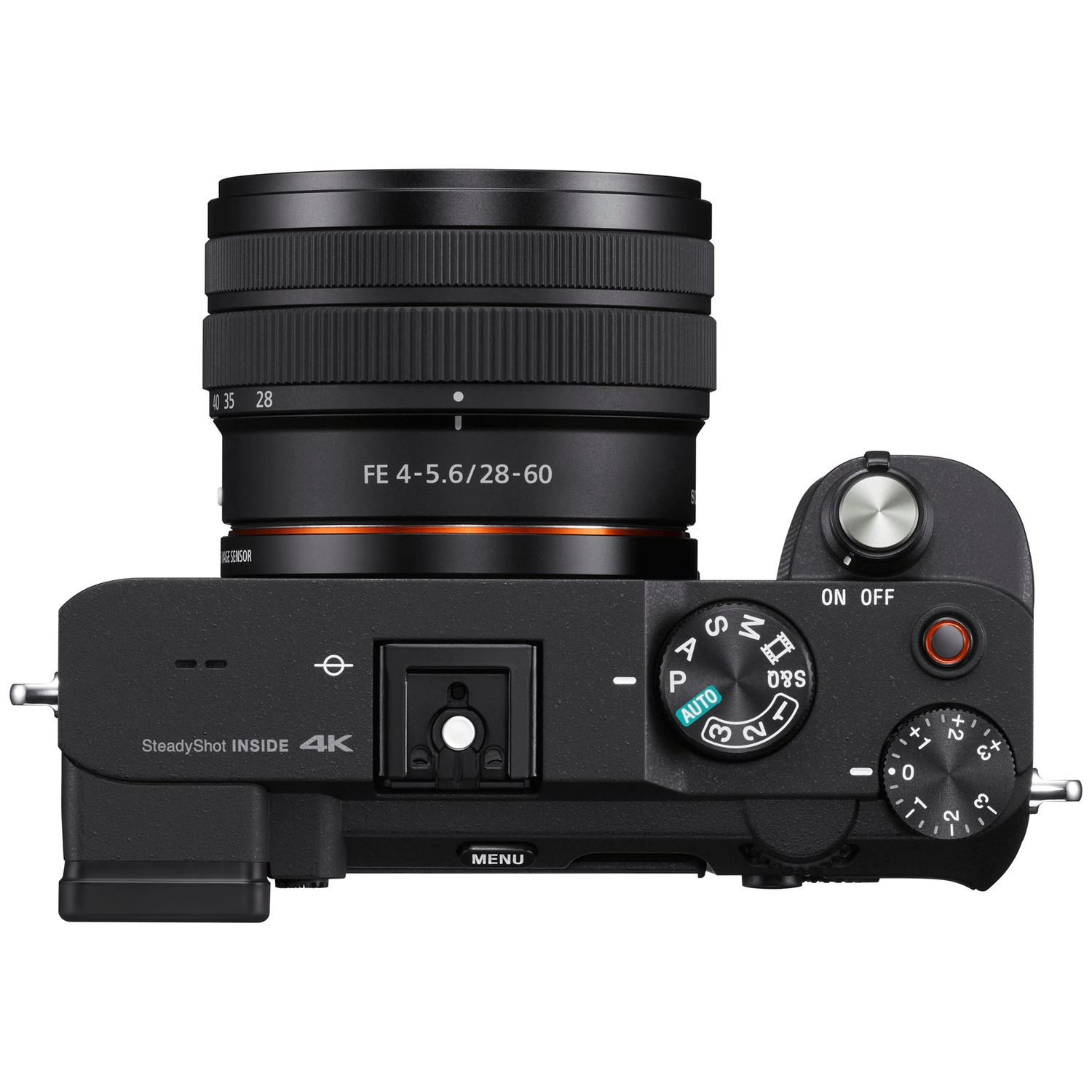 Top view of a black camera with lens, dials, and buttons.