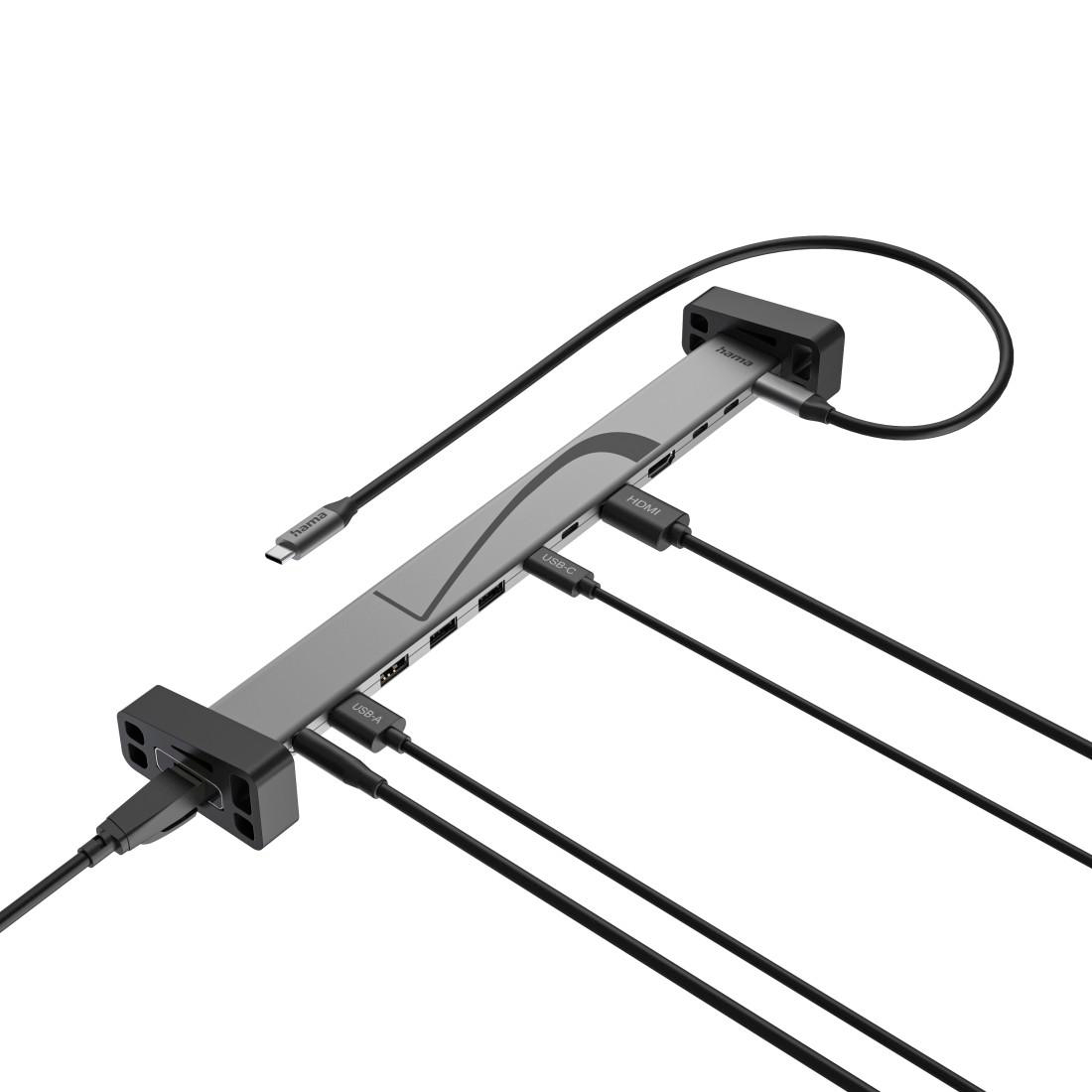 Grauer USB-C-Hub mit HDMI-, USB-A- und USB-C-Anschlüssen sowie Kabeln.