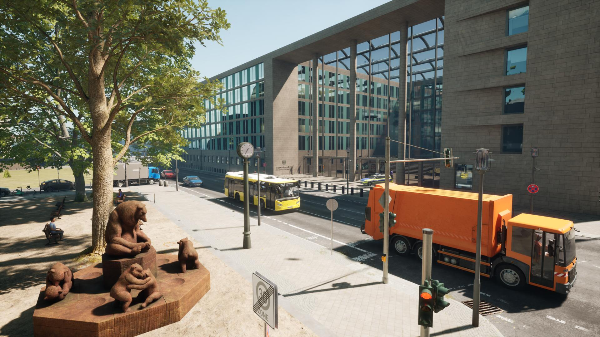 Ein Bärenskulpturen-Ensemble steht vor einem modernen Gebäude mit Glasfassade und Verkehr.