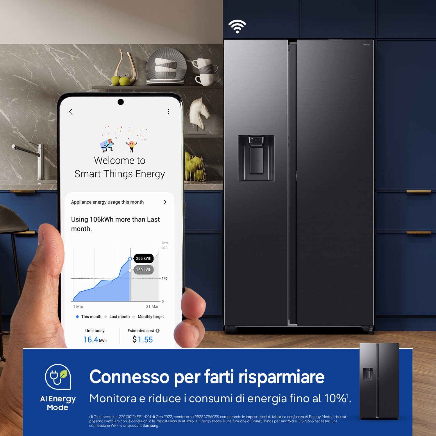 Uno smartphone mostra l'app Smart Things Energy con dati del frigorifero. Accanto c'è un frigorifero nero.
