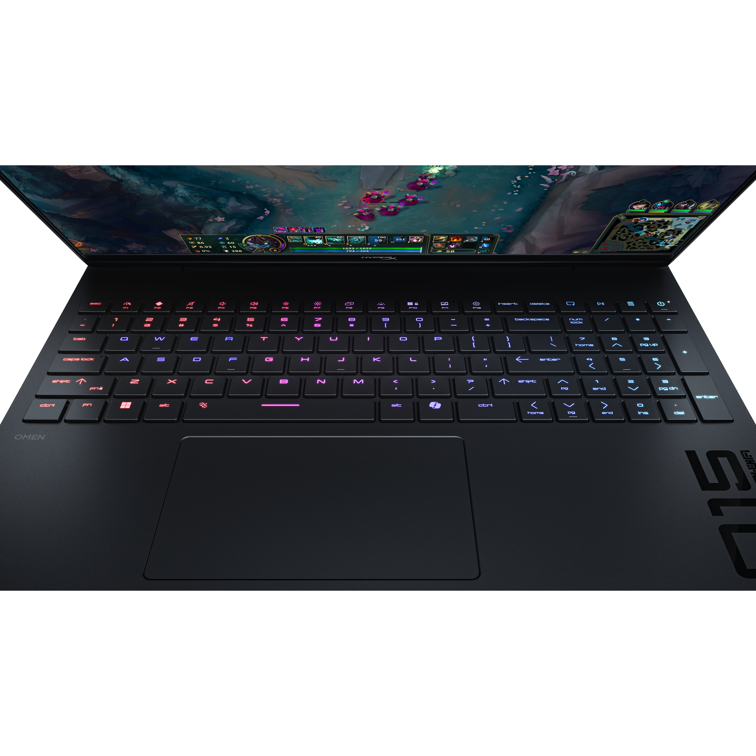 A black laptop with a backlit keyboard displays a game on its upper screen area.
