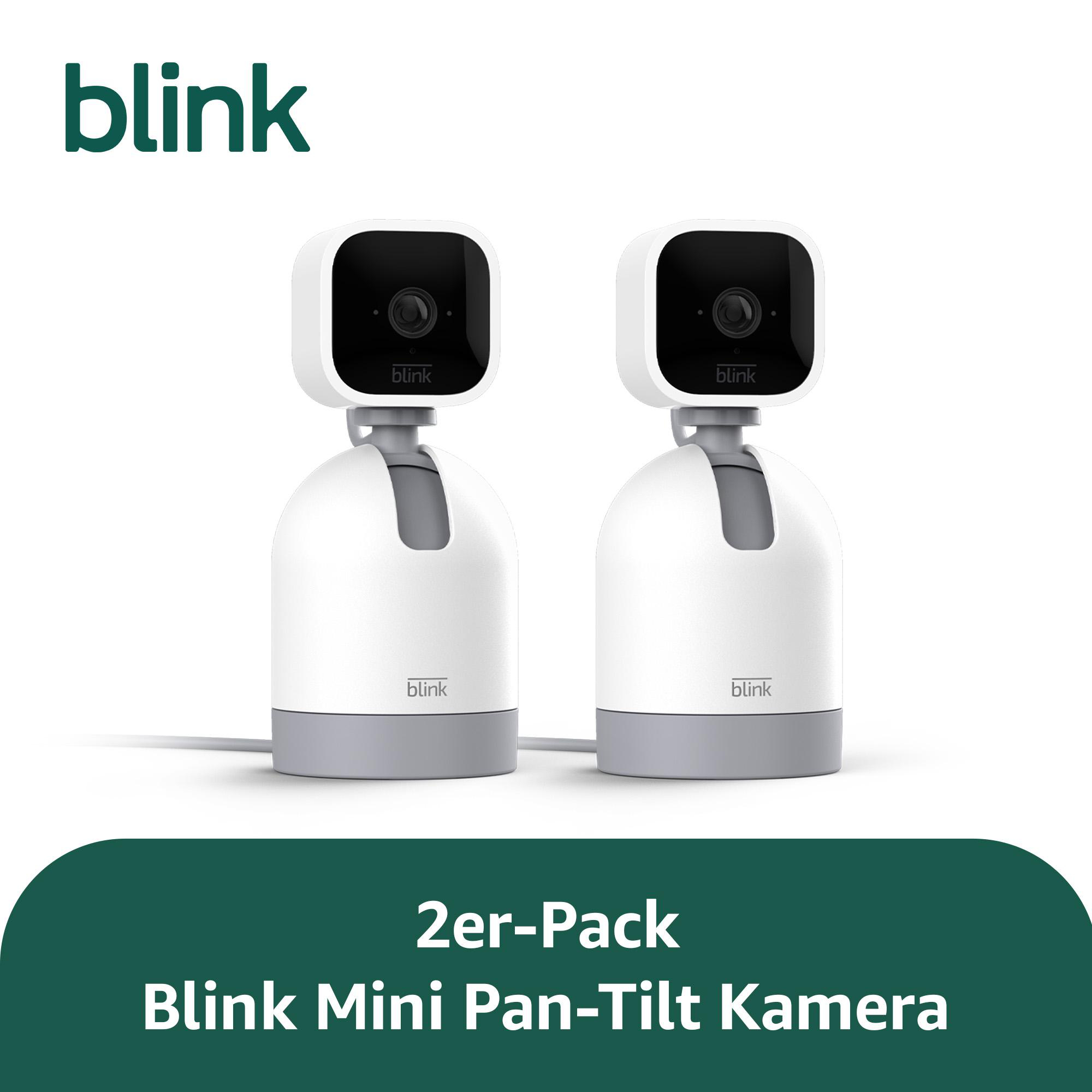 Zwei weiße Blink Mini Pan-Tilt Kameras mit grauem Sockel auf weißem Hintergrund.