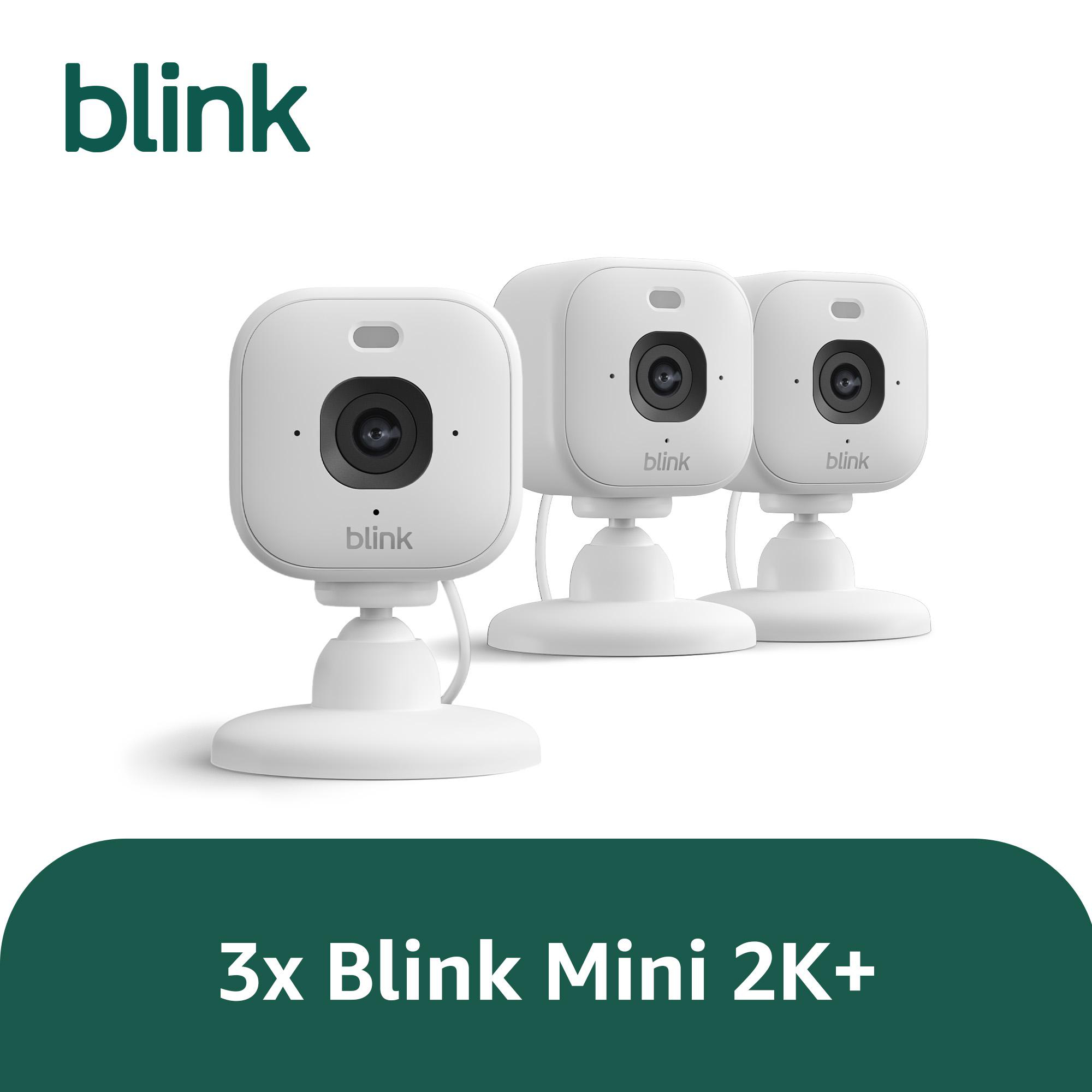 Drei weiße Blink Mini 2K+ Kameras auf einem weißen Hintergrund.