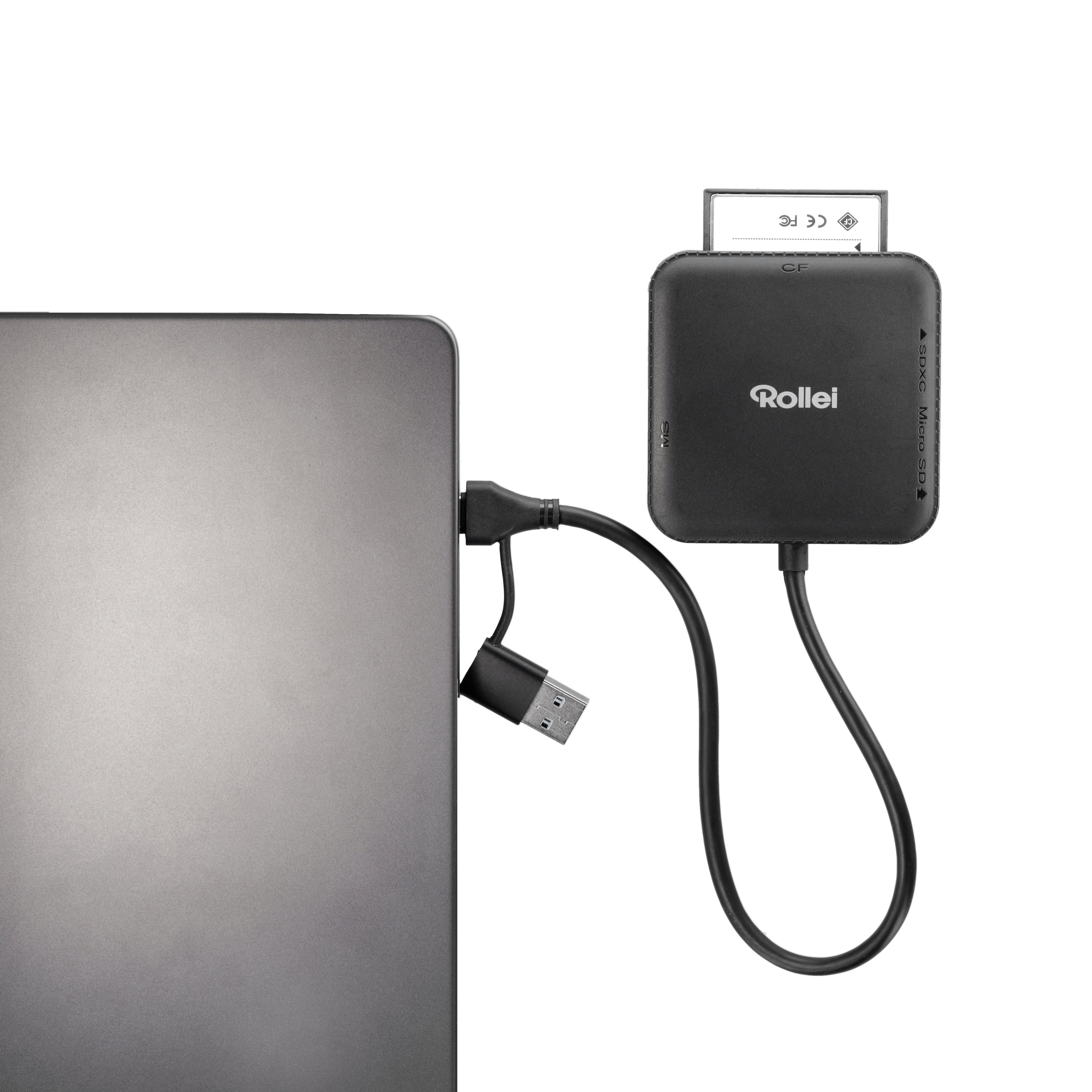 Ein schwarzer Kartenleser mit Rollei-Logo ist mit einem Laptop verbunden.