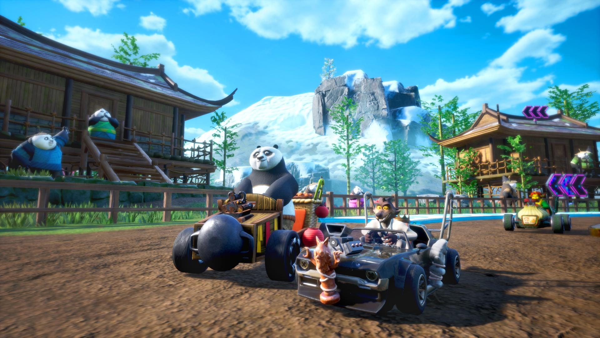 Ein Panda und ein Wolf fahren Go-Karts in einer Berglandschaft mit traditionellen Gebäuden.