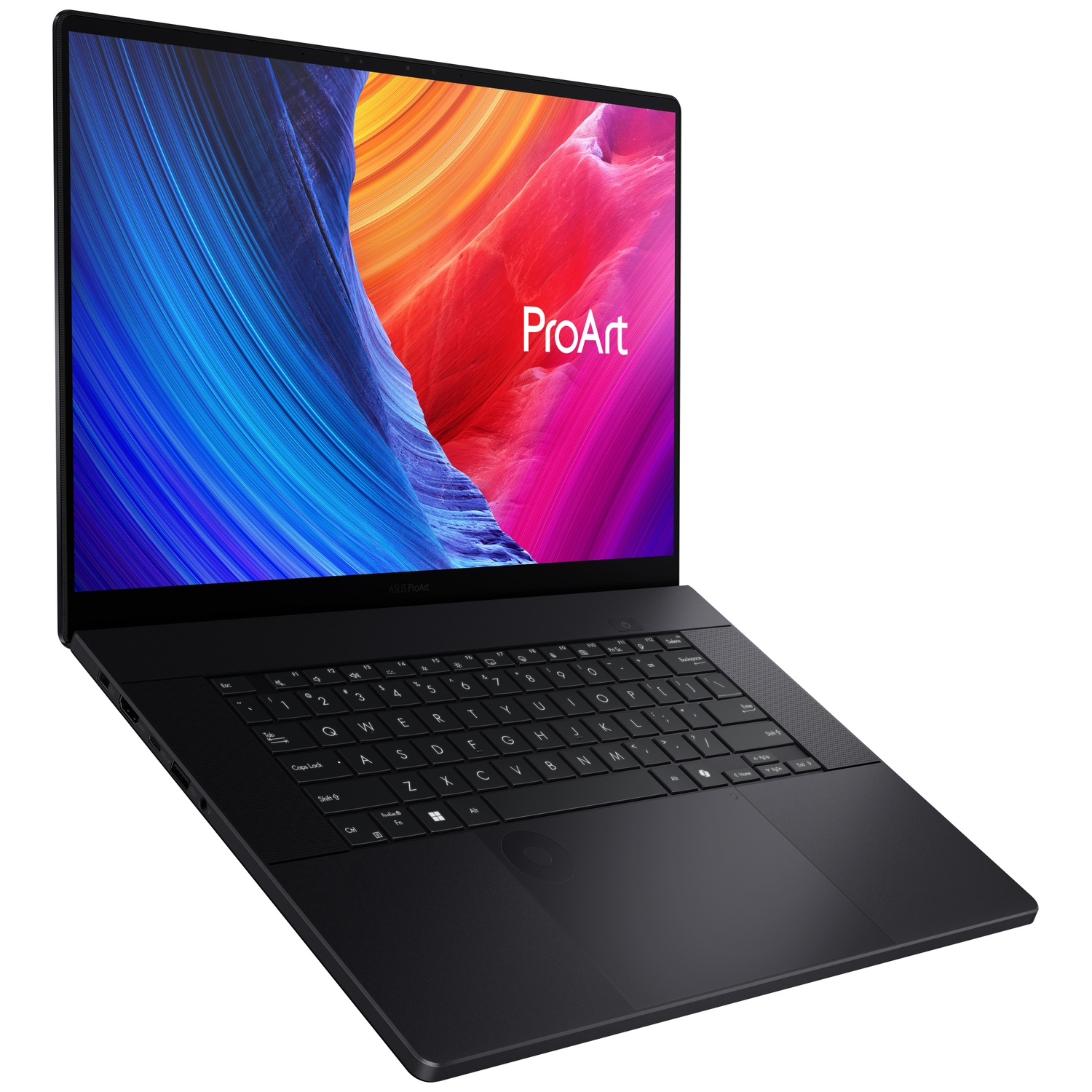 Ordinateur portable ASUS ProArt noir avec fond d'écran abstrait et vibrant.