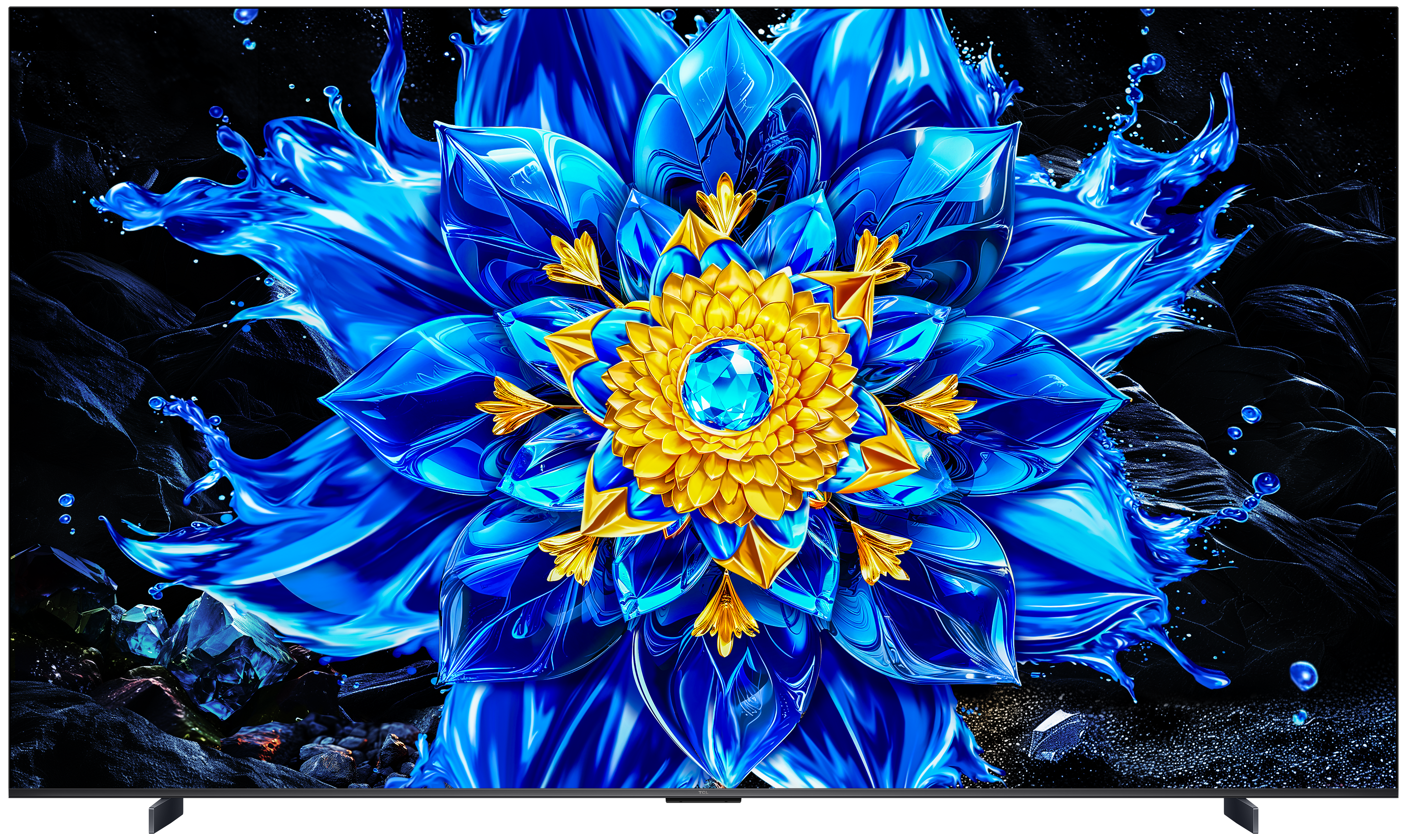 Eine blaue und goldene Blume mit spritzendem Wasser auf schwarzem Hintergrund.
