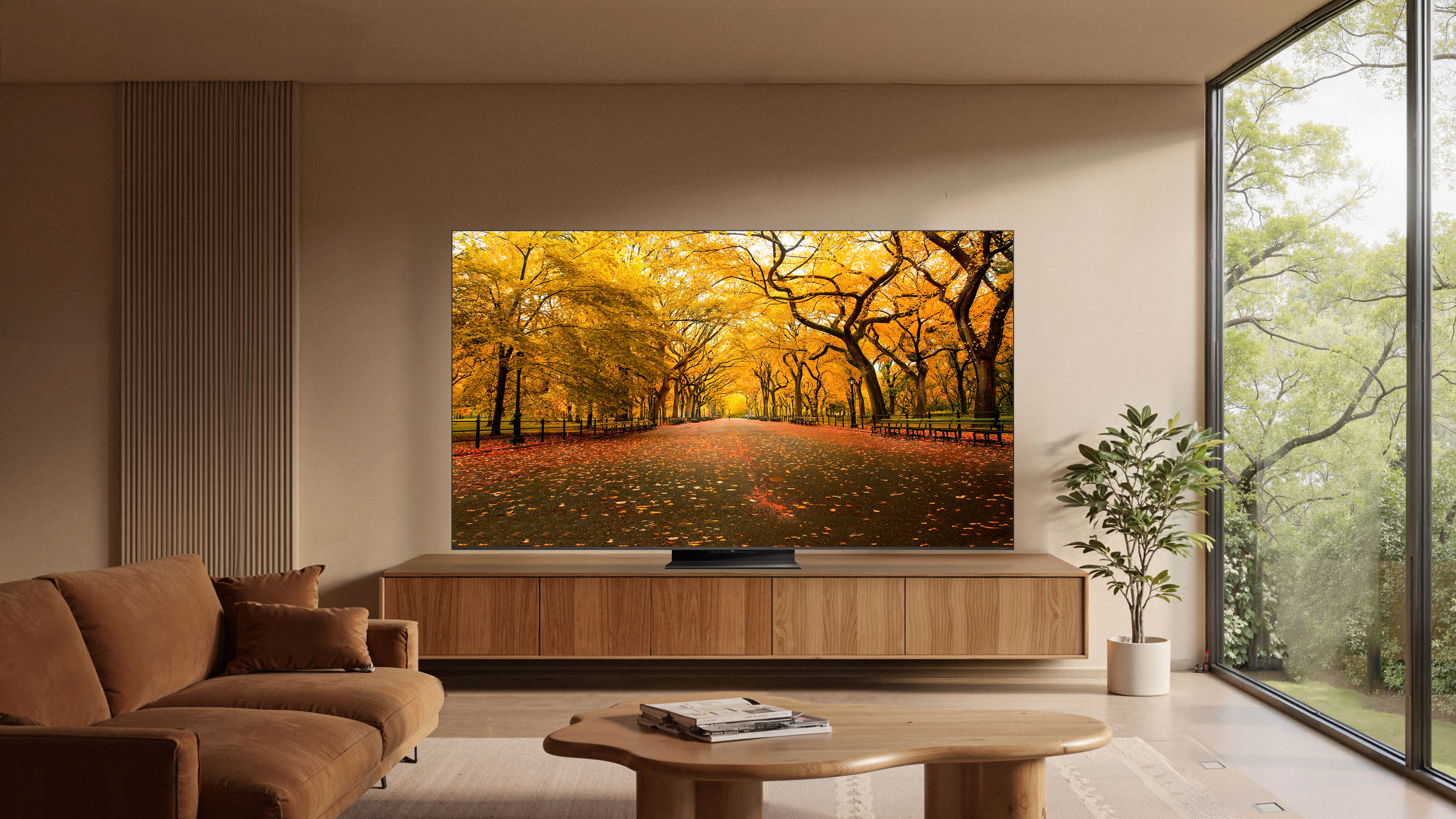 Ein modernes Wohnzimmer mit großem Fernseher, der eine Herbstpark-Szene zeigt.