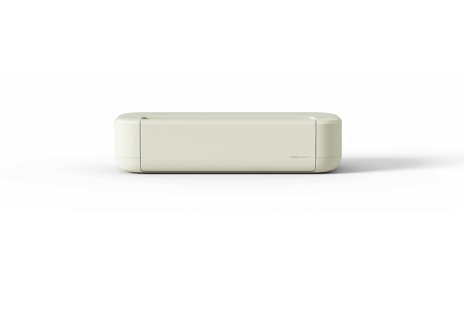 Una máquina de corte beige claro con el logo 'cricut explore 5'.