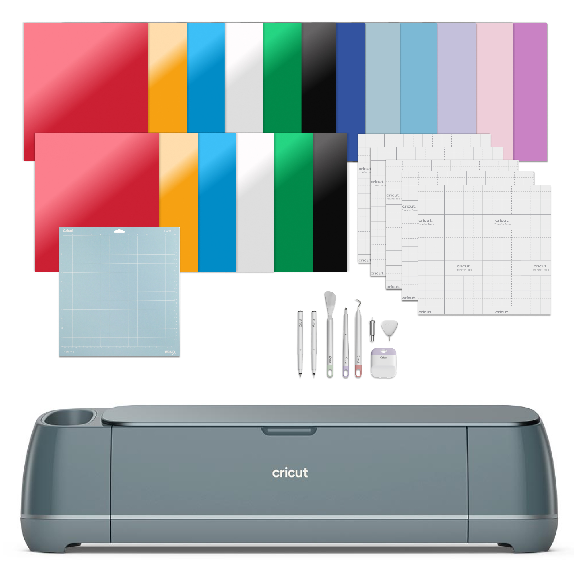 Máquina de corte Cricut con láminas de vinilo, cinta de transferencia y herramientas.