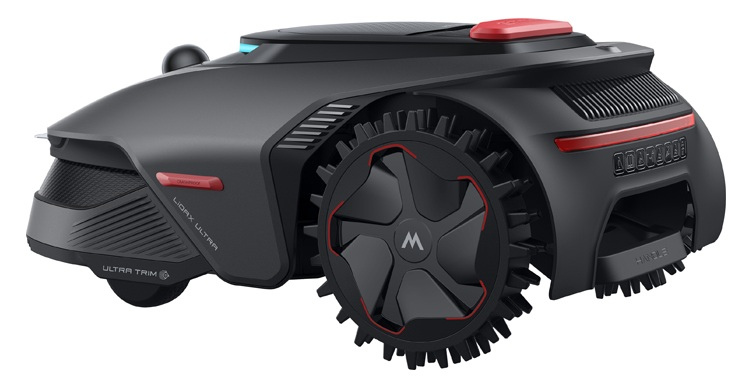 Czarna kosiarka automatyczna z czerwonymi akcentami i dużymi kołami na białym tle.