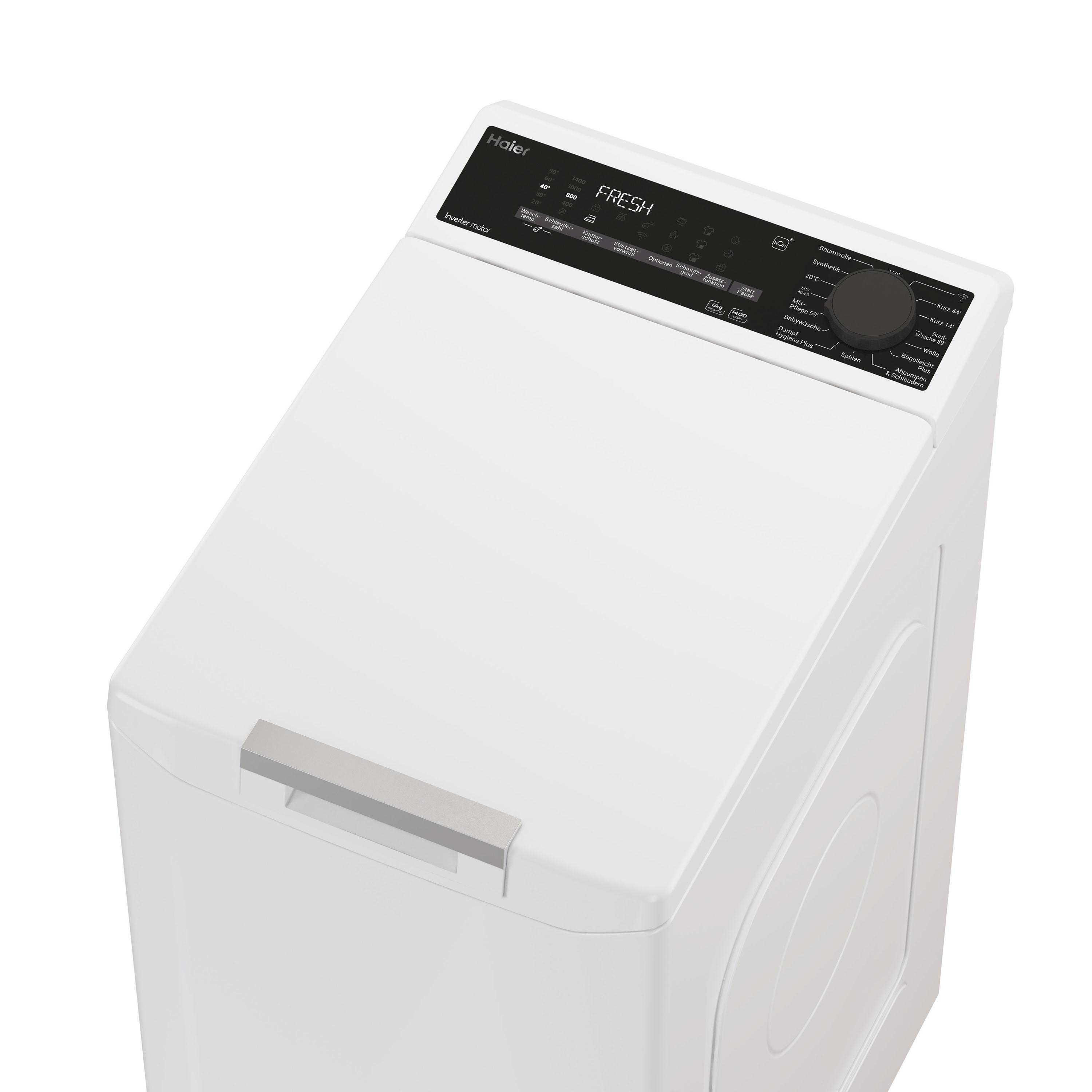 Eine weiße Haier Waschmaschine mit schwarzem Bedienfeld und Drehknopf.