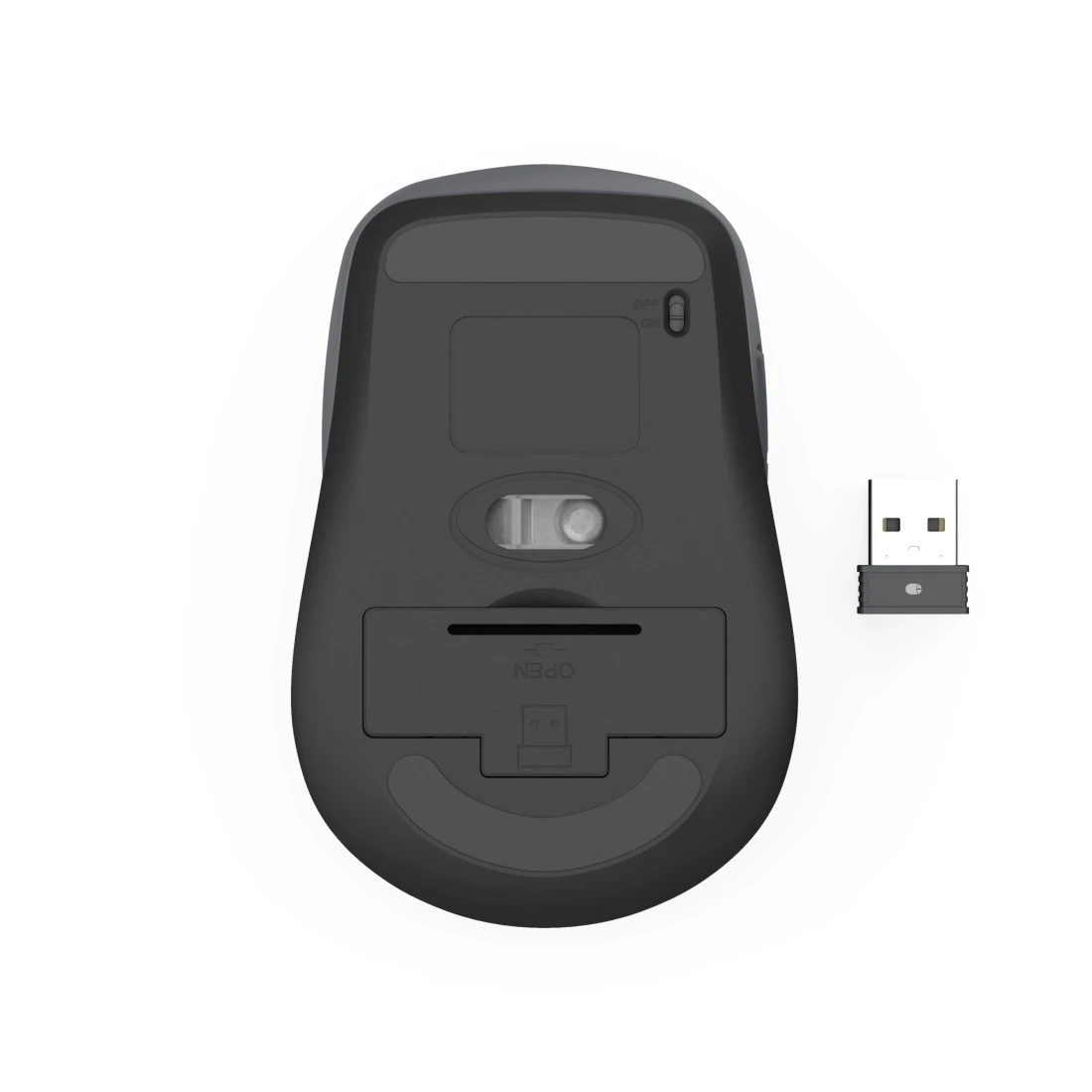 Spód ciemnej myszy komputerowej z odbiornikiem USB obok.