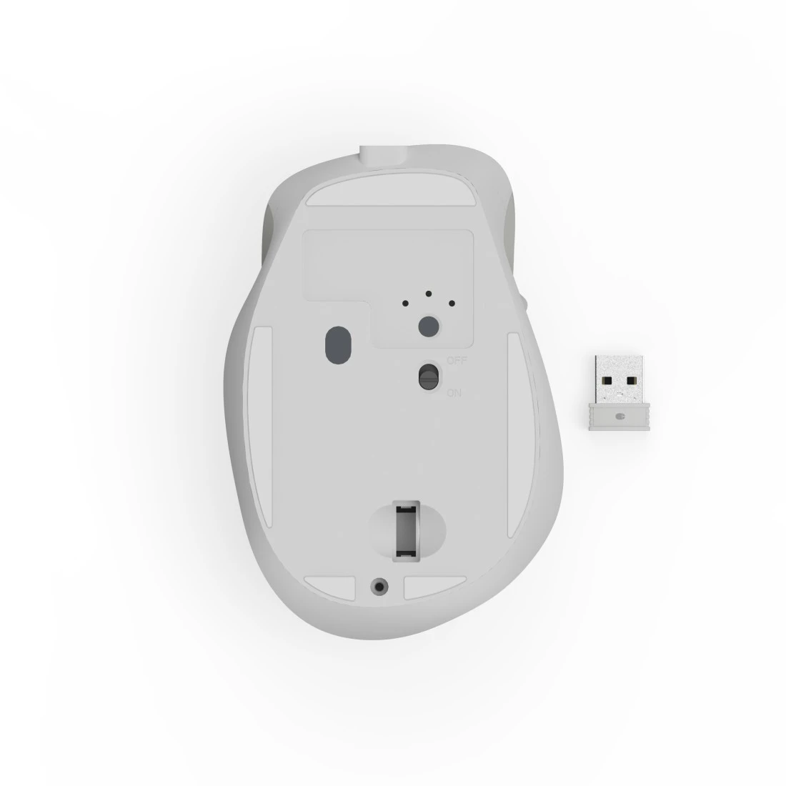 Spód białej myszy i odbiornik USB na białym tle.