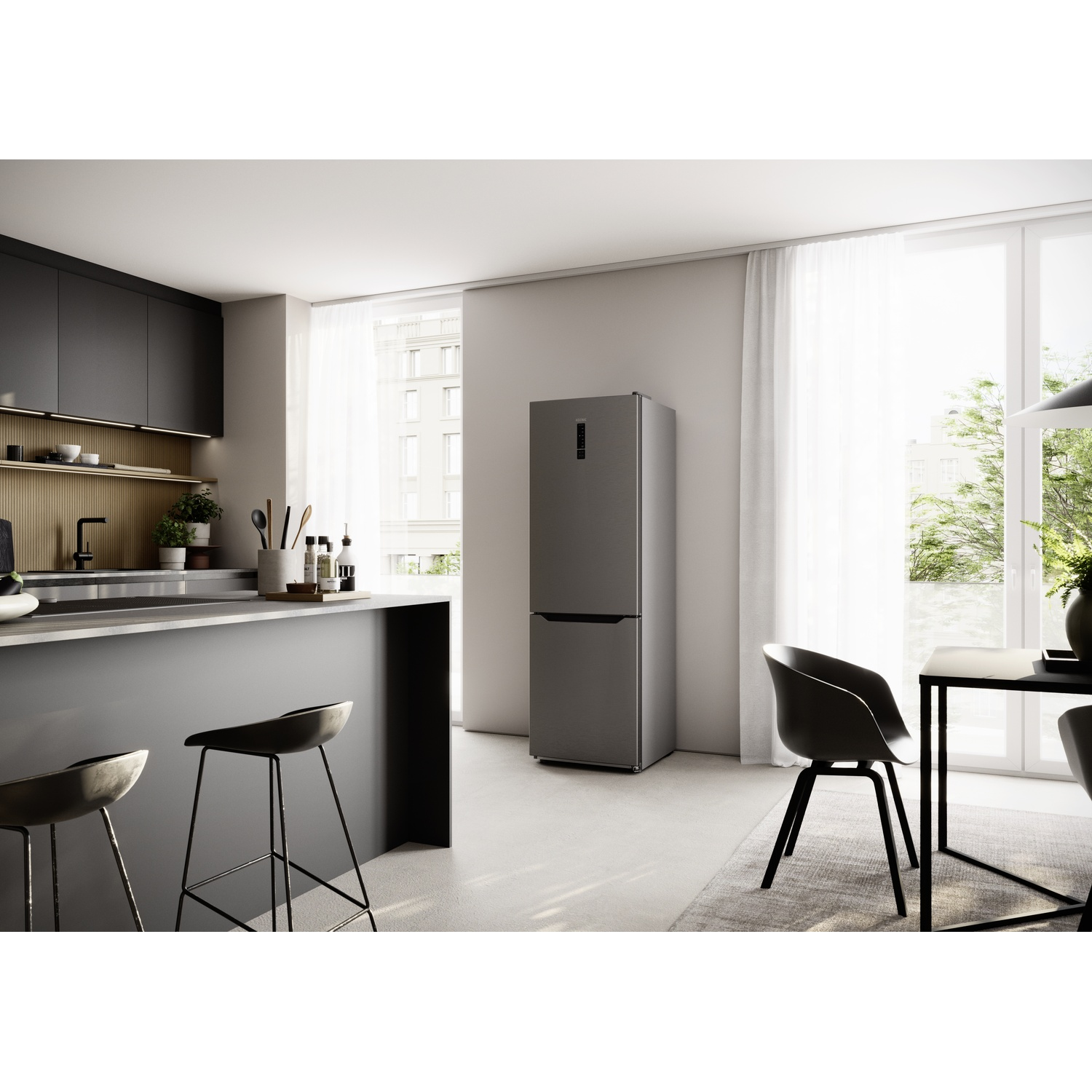 Modern kitchen with gray island, bar stools, refrigerator, table, and chairs.