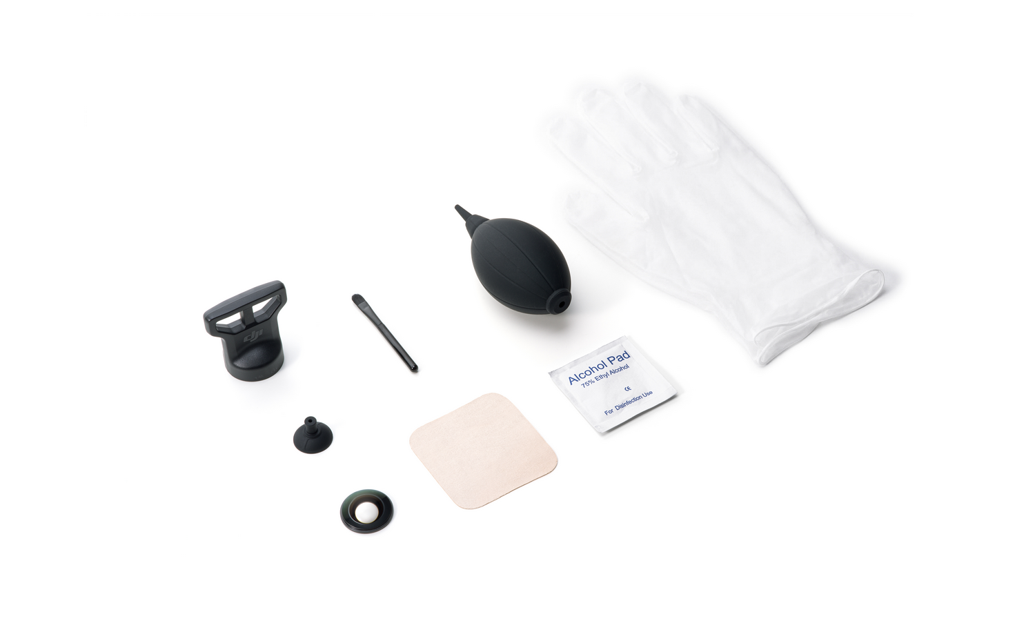 Un soporte DJI, pincel, ventosa, anillo y un paquete de guantes blancos.