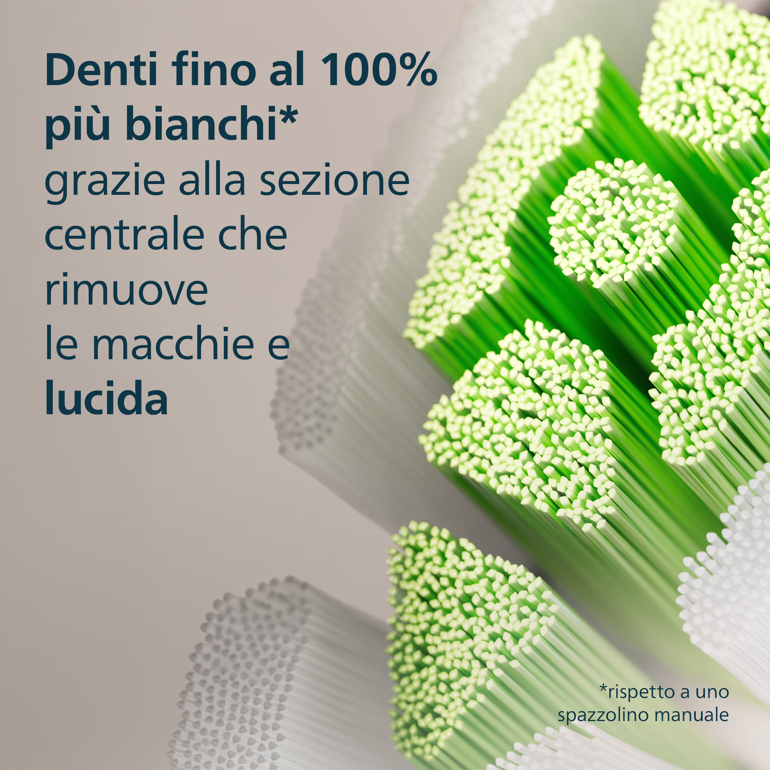 Primo piano di setole di spazzolino verdi e bianche per denti più bianchi.