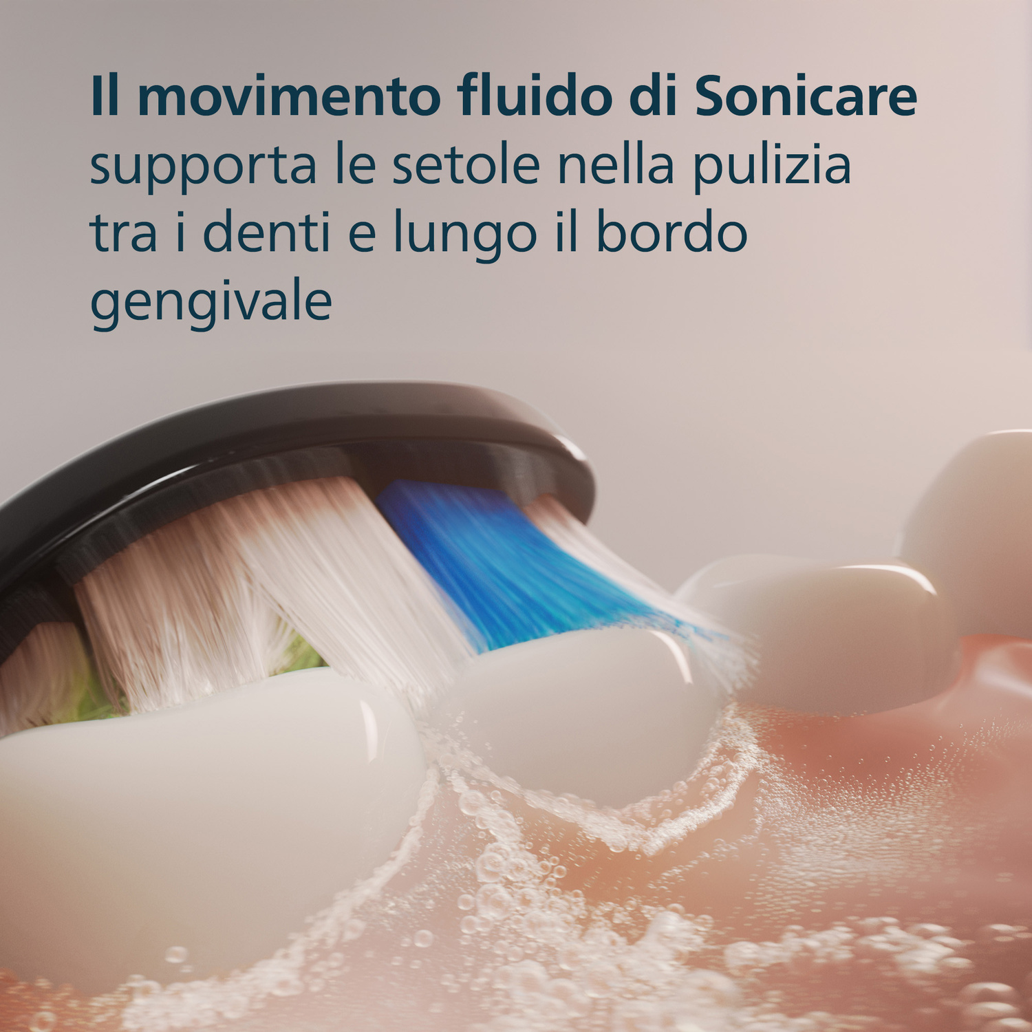 Spazzolino elettrico pulisce denti e gengive con schiuma e bolle.