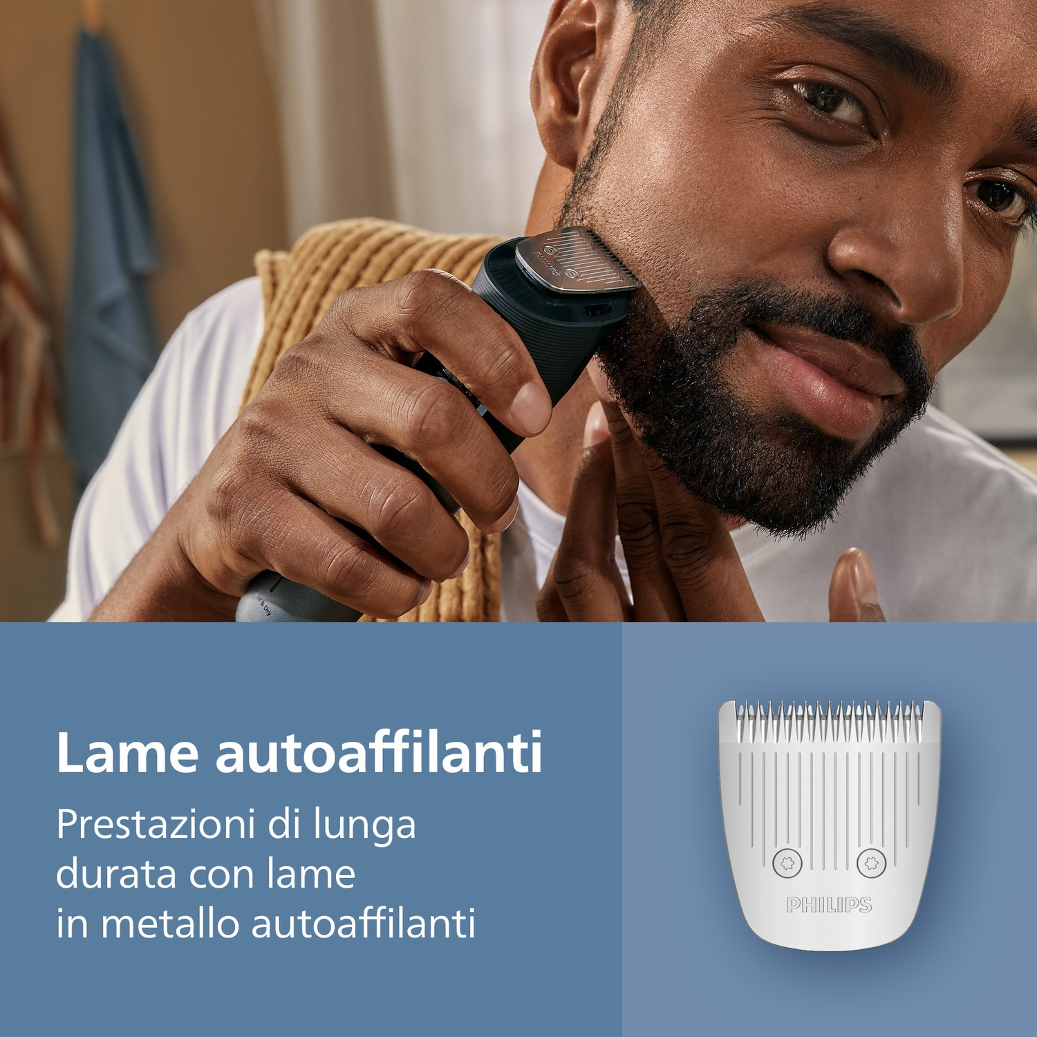 Uomo si rade la barba con un rifinitore Philips. Una lama è a fuoco.