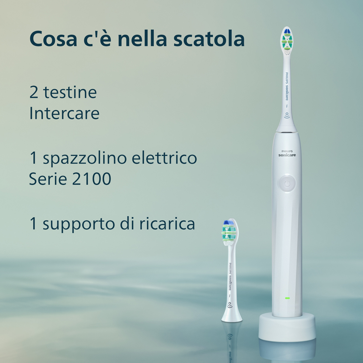 Spazzolino elettrico, base di ricarica e 2 testine su sfondo chiaro.