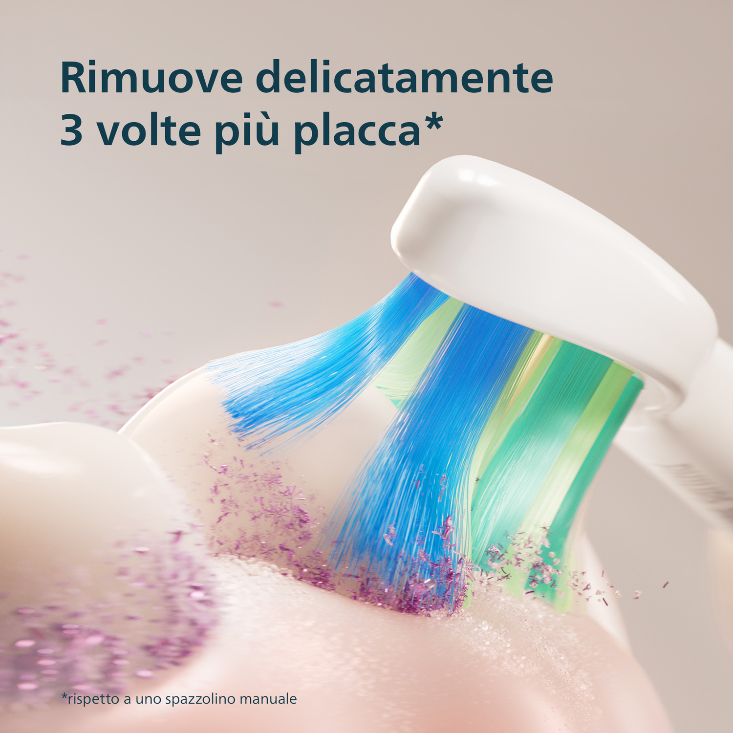 Spazzolino elettrico con setole blu e verdi che rimuove la placca.
