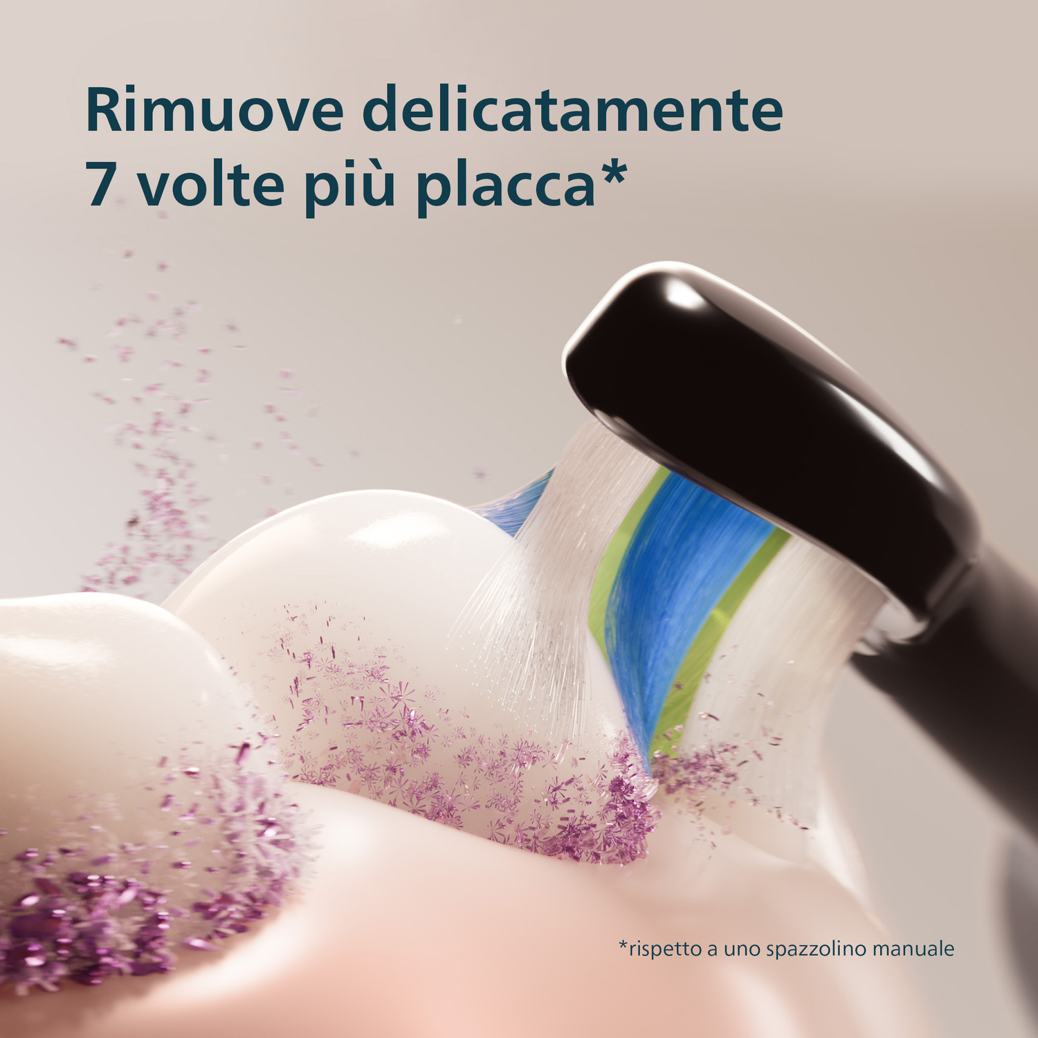 Spazzolino elettrico rimuove particelle viola dai denti.