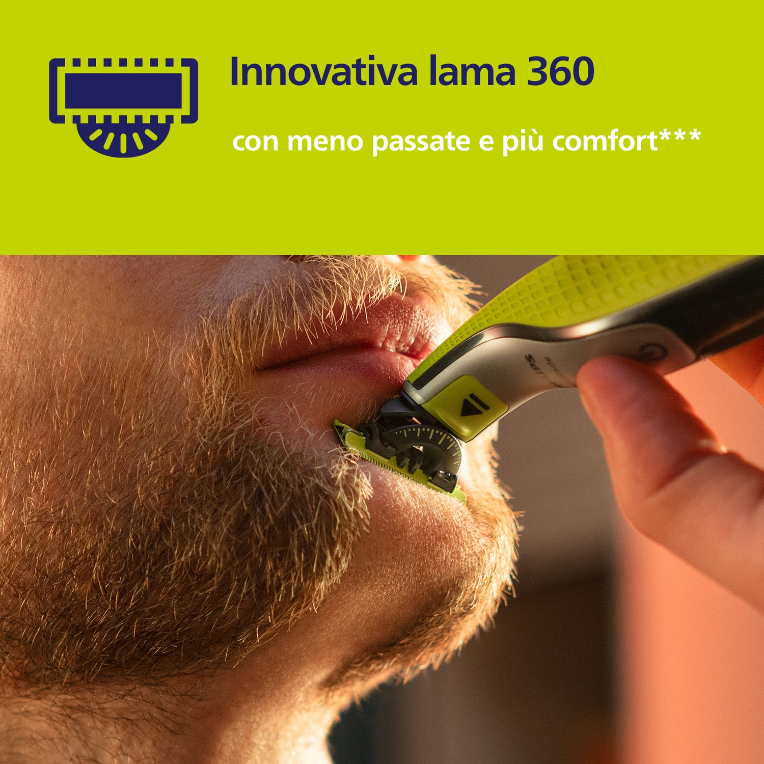 Primo piano di un uomo che si rade la barba con un rifinitore elettrico, dispositivo verde e grigio.