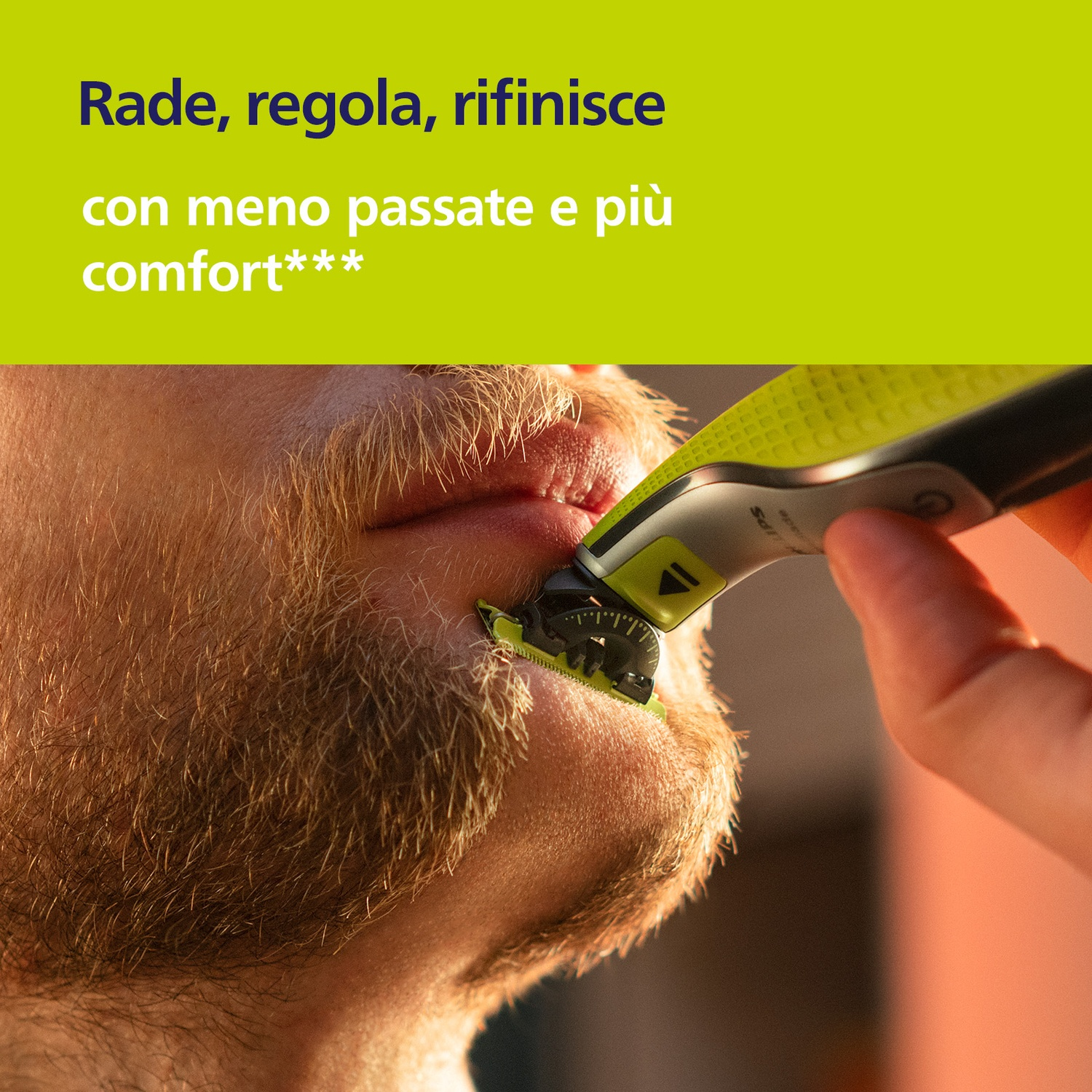Uomo che si rade con rifinitore elettrico, primo piano di bocca e barba.