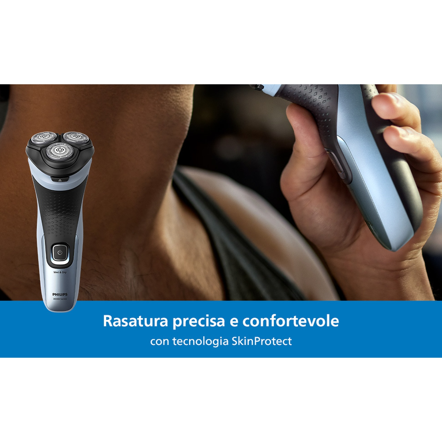 Un uomo tiene un rasoio elettrico blu con tre testine rotanti.