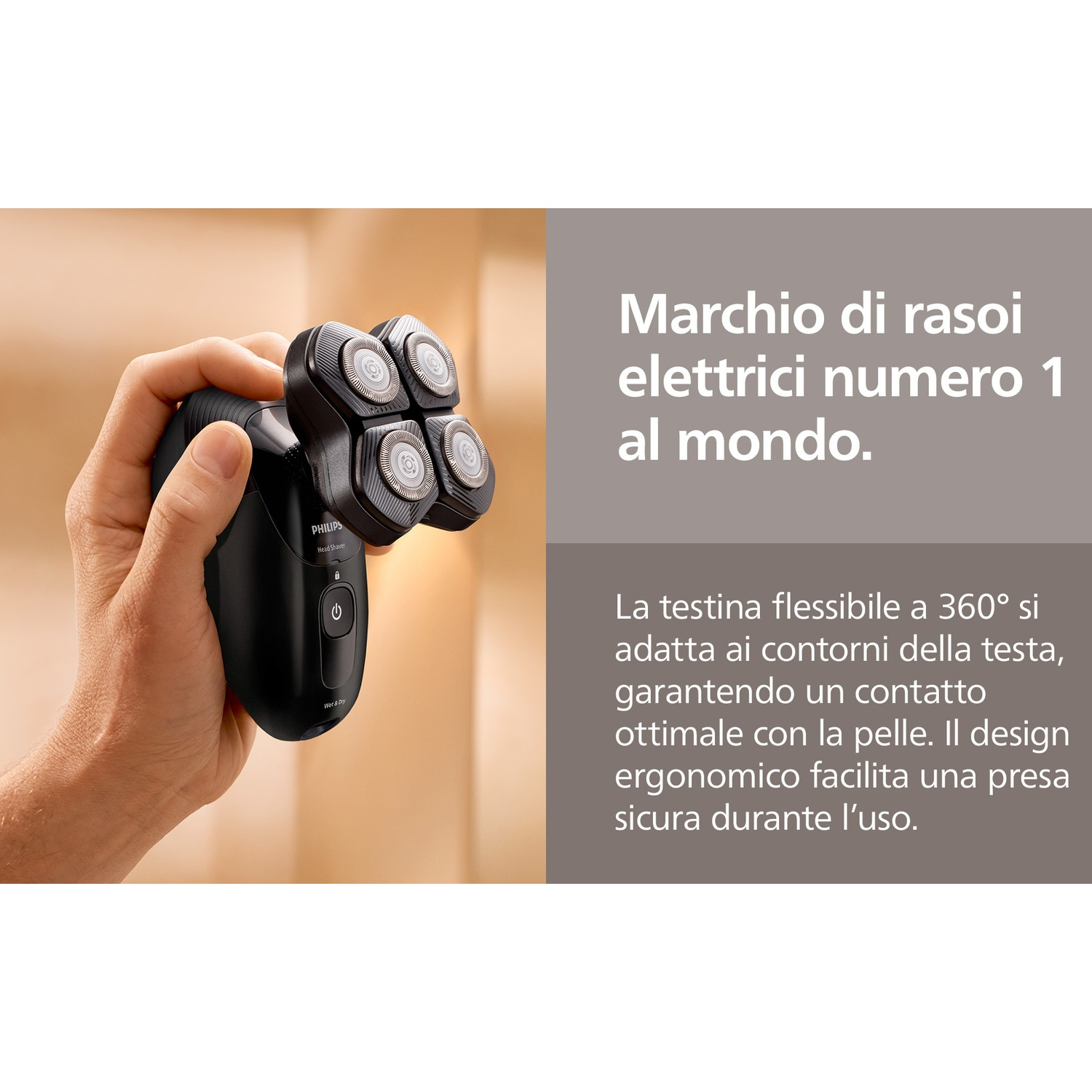Una mano tiene un rasoio elettrico Philips nero con quattro testine rotanti.