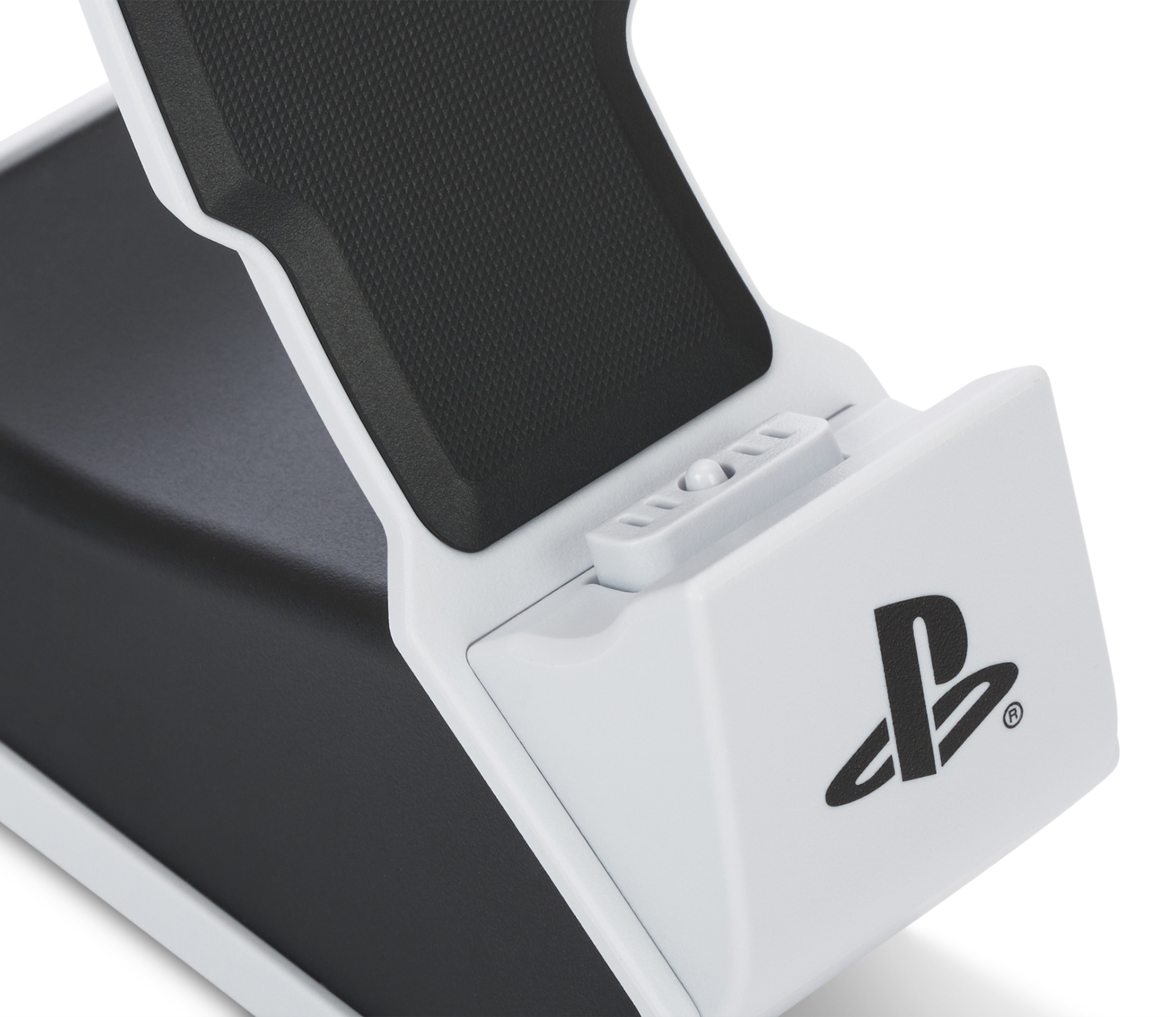 PS logosu ve siyah kauçuk tutamağa sahip beyaz şarj standı.