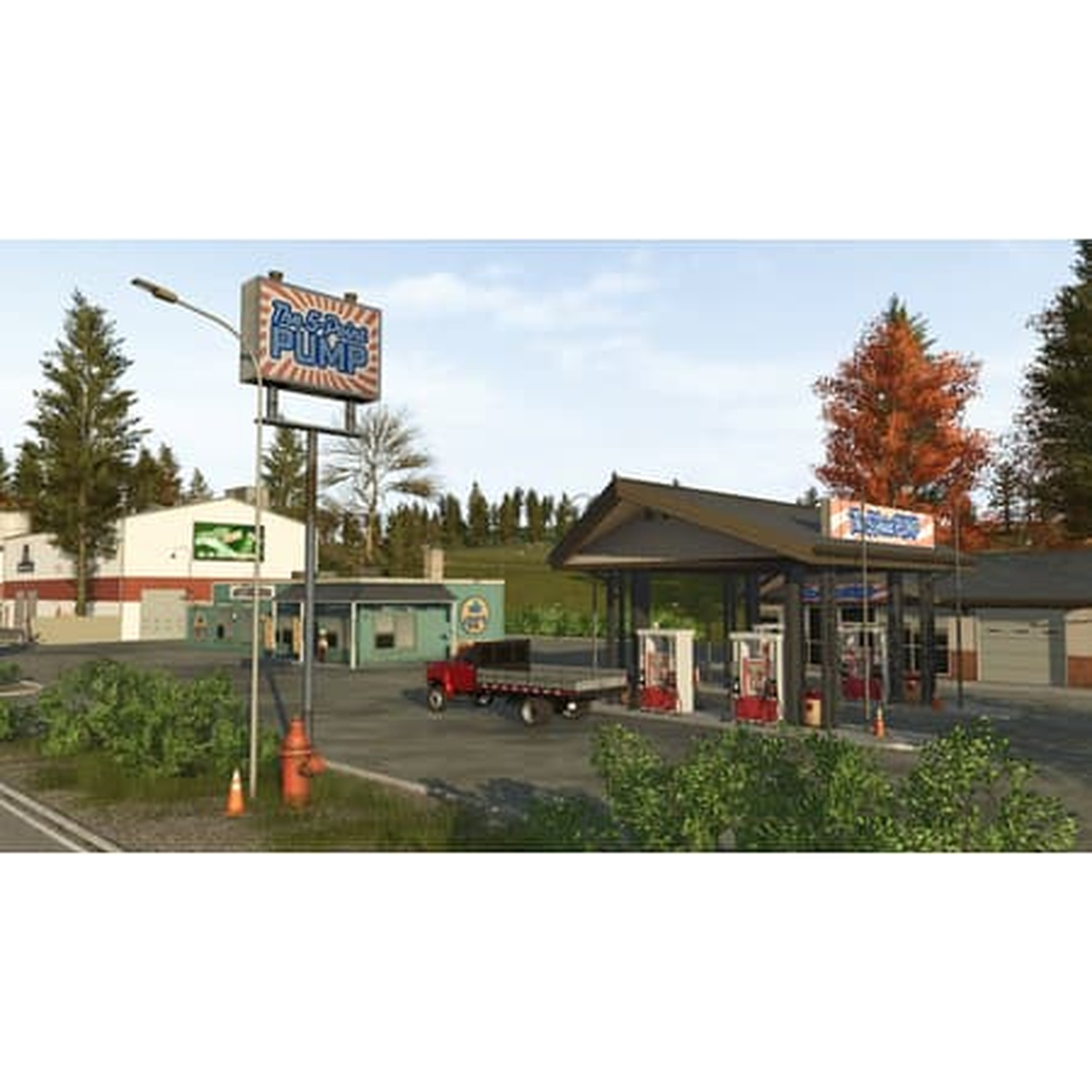 Station-service avec pompes, un camion rouge et une grande enseigne 'The Spot Pump'.