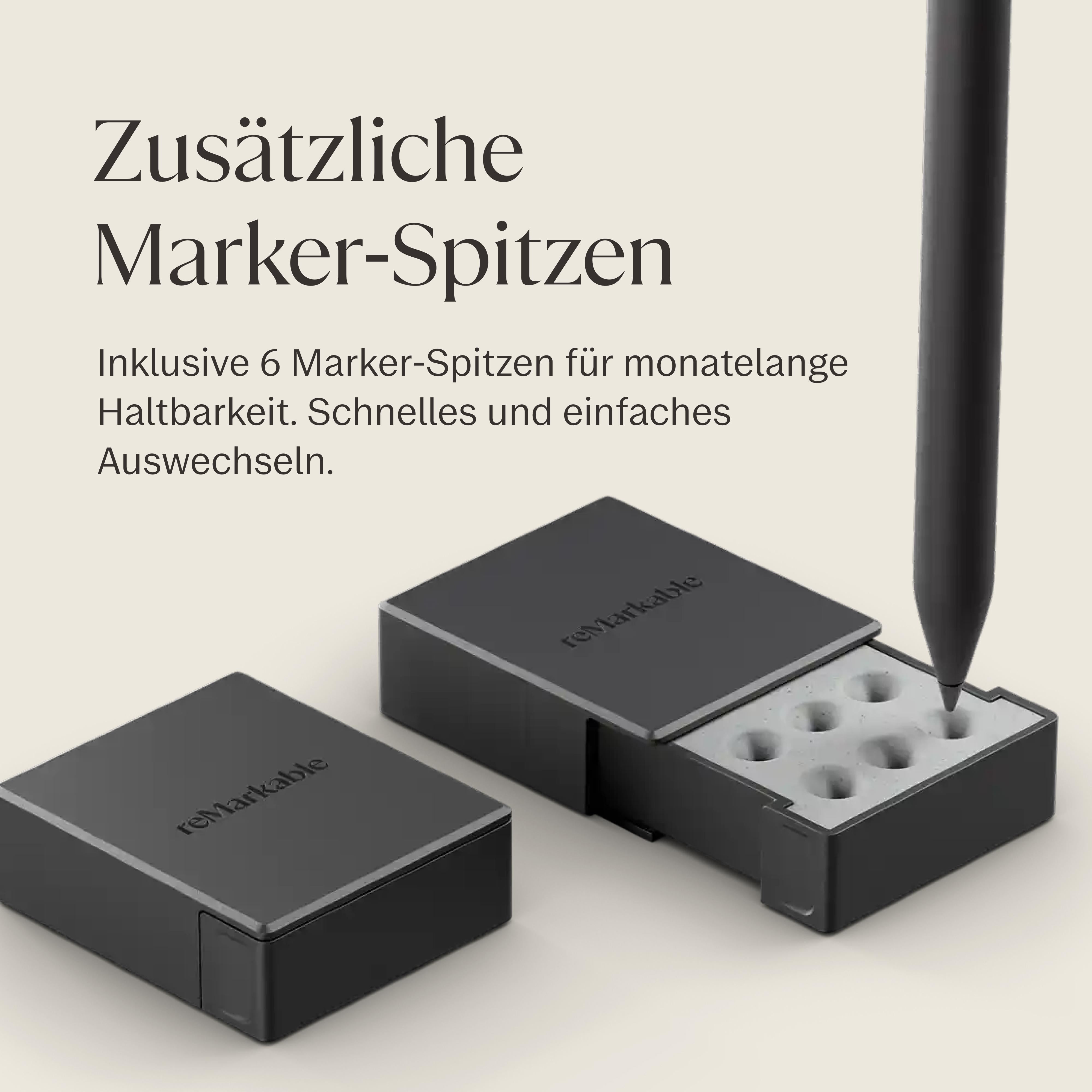 Zwei schwarze reMarkable Marker-Spitzendosen mit einer Spitze, die in eine eingelegt wird.