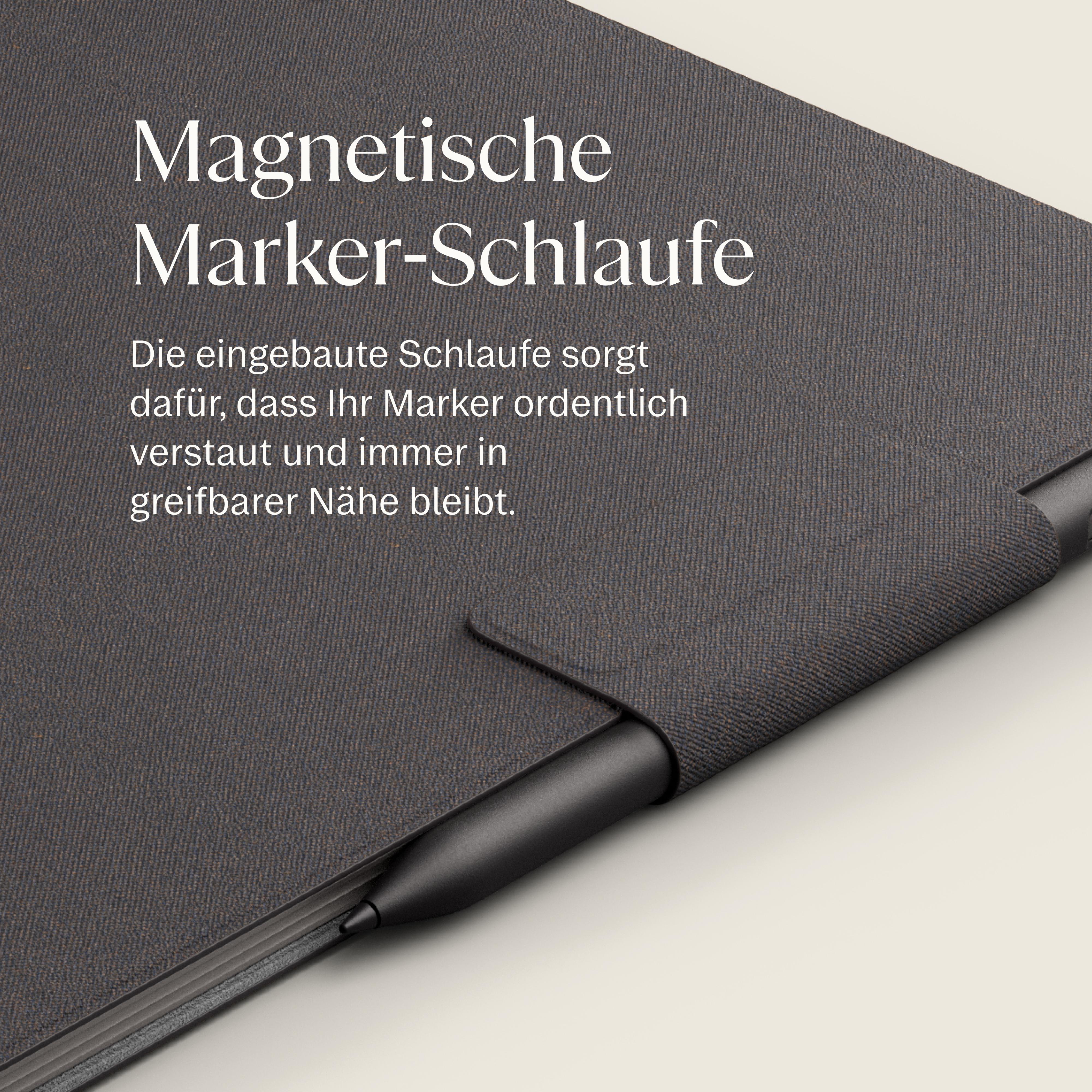 Grauer Einband mit schwarzem Stift in einer magnetischen Schlaufe.