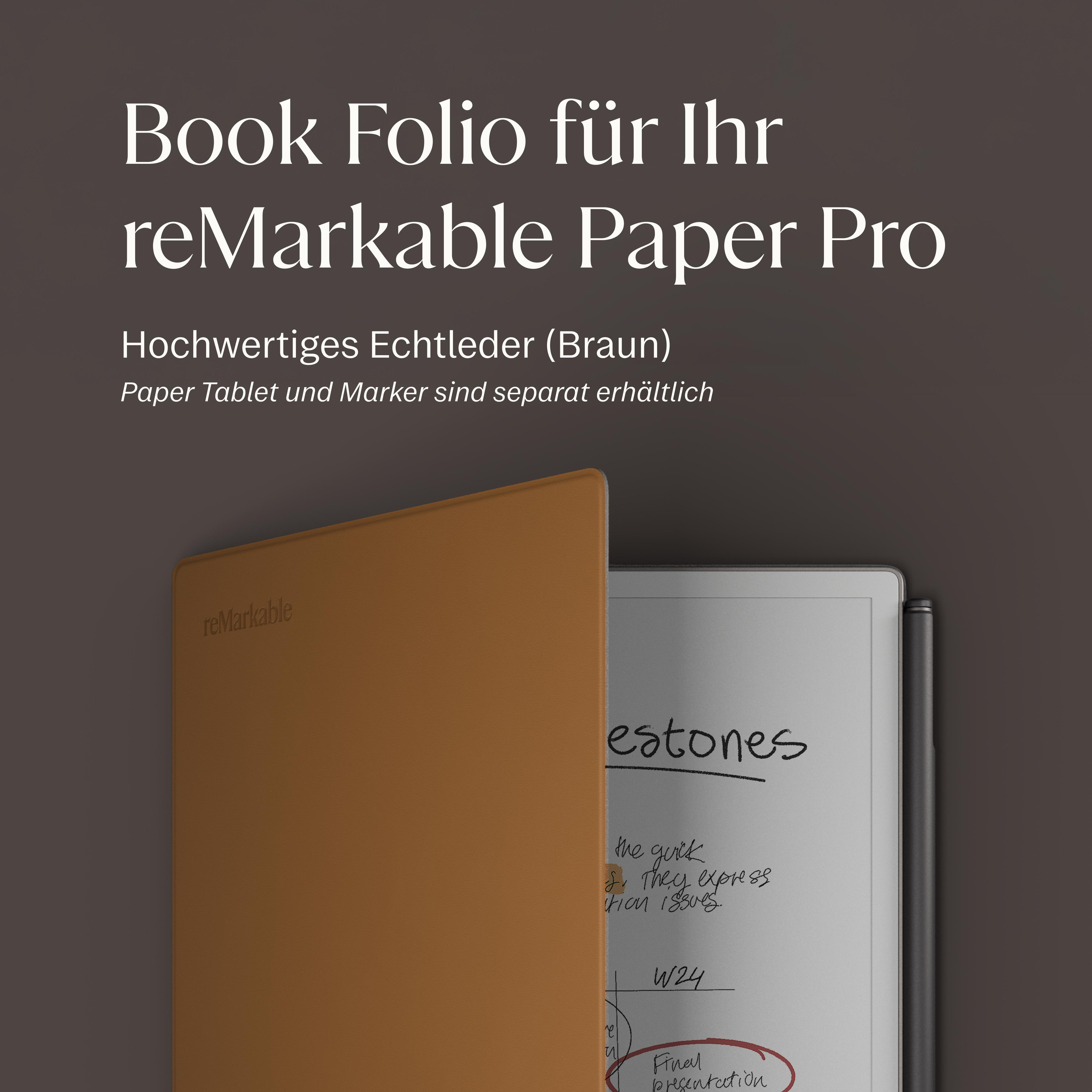 Ein braunes Lederbuch mit einem Remarkable Tablet und Notizen.
