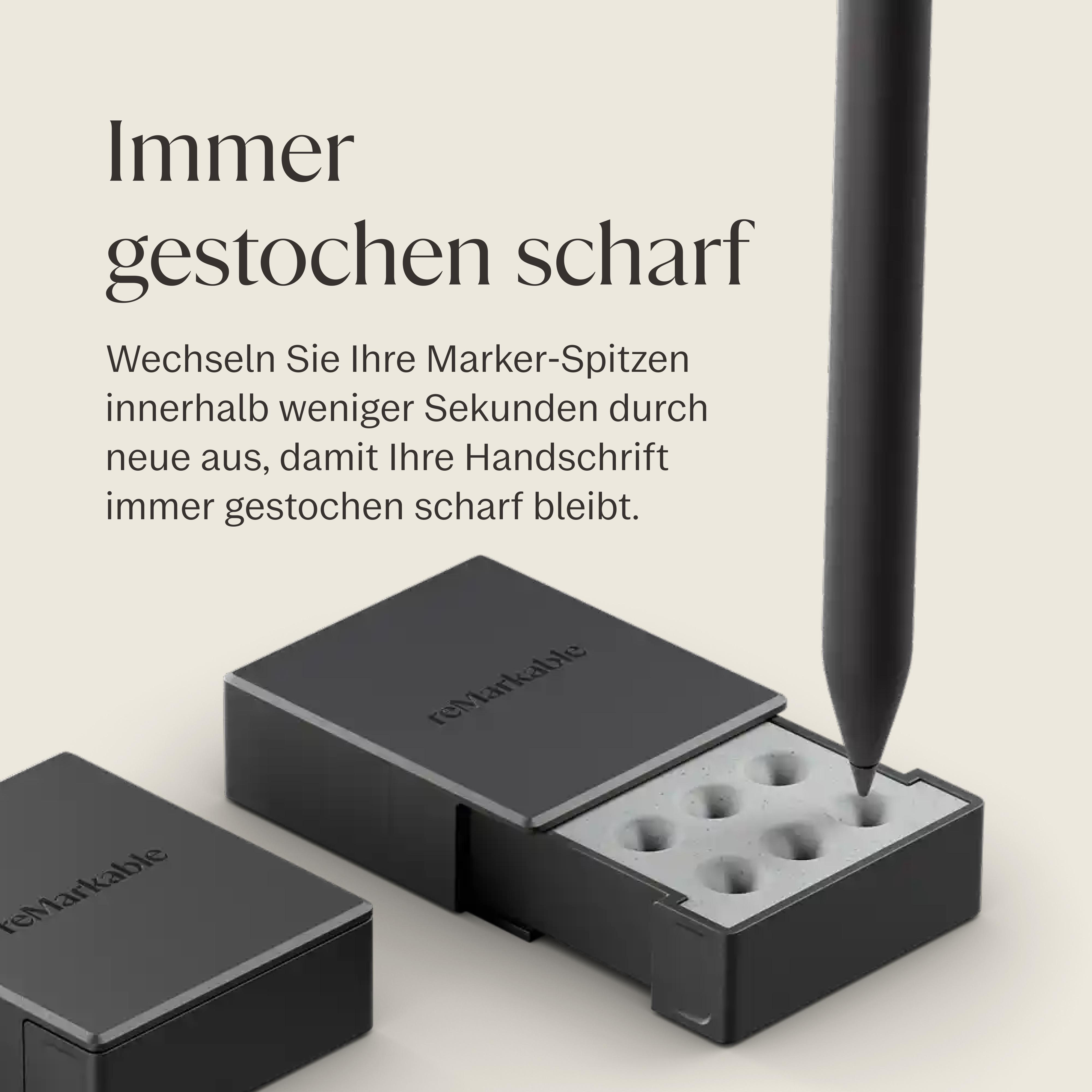 Ein schwarzer Stylus und eine Box mit Ersatzspitzen für einen digitalen Stift.