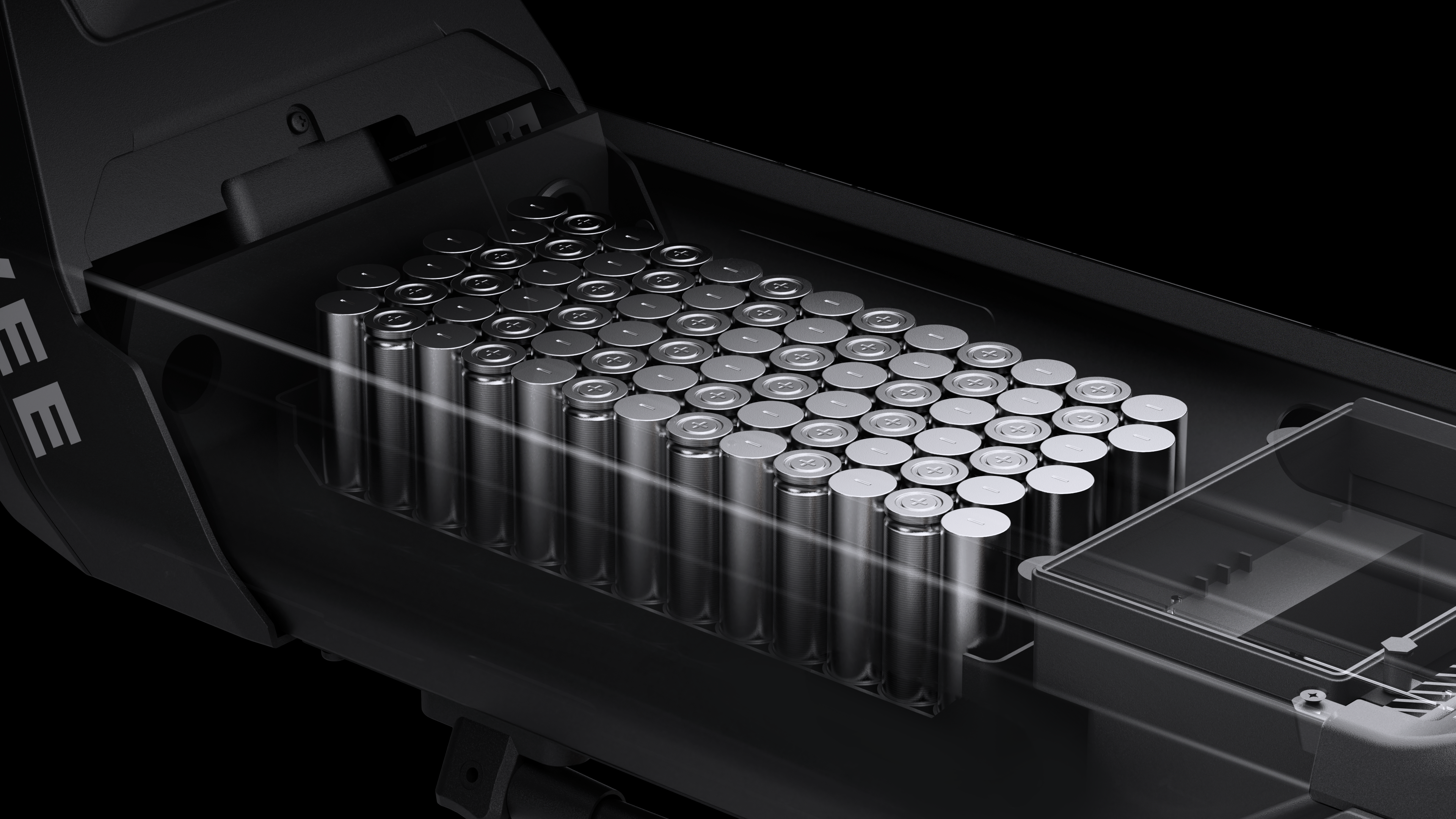 Zylinderförmige Batterien in einem schwarzen Gehäuse, detaillierte Ansicht.
