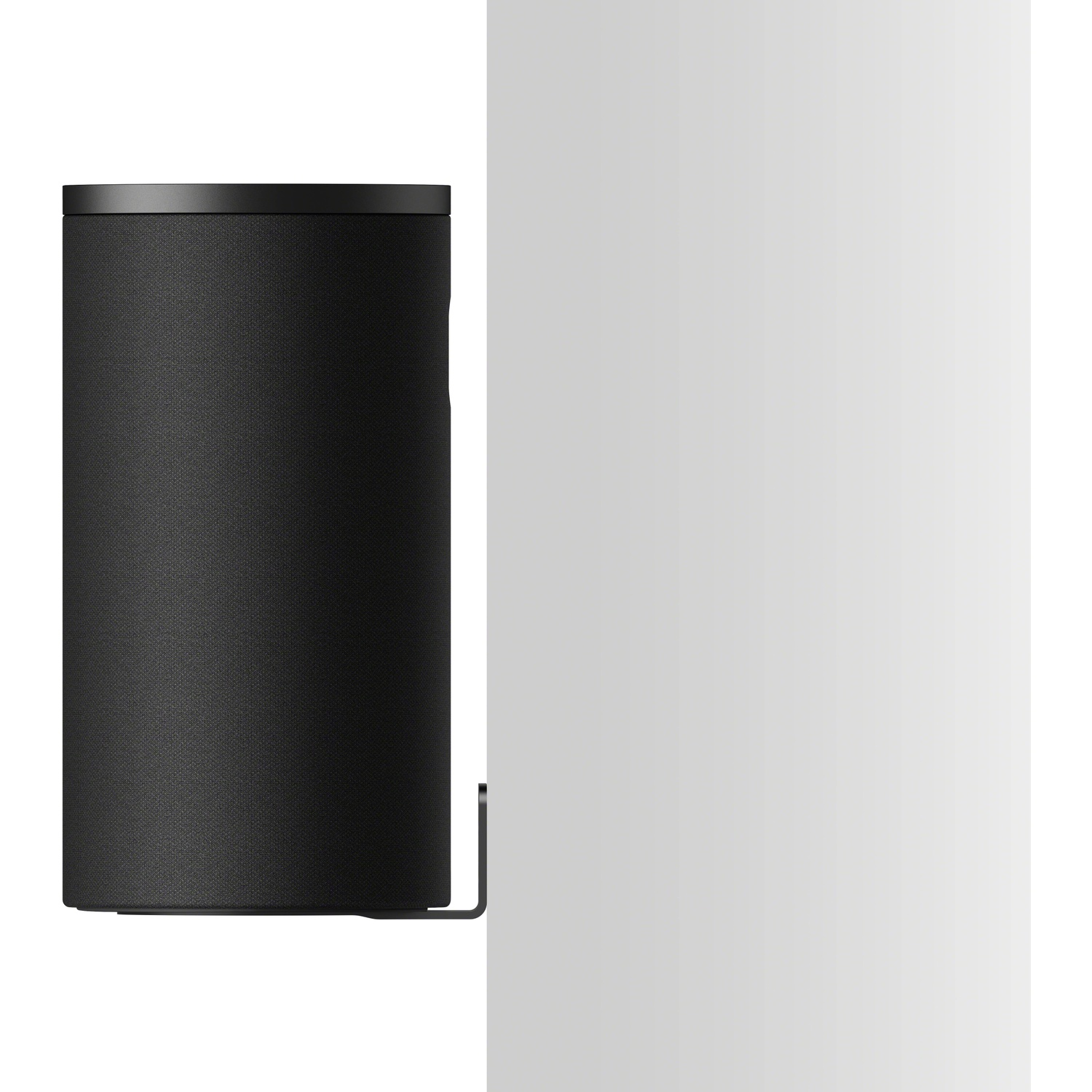 Enceinte cylindrique noire avec dessus noir et support métallique.