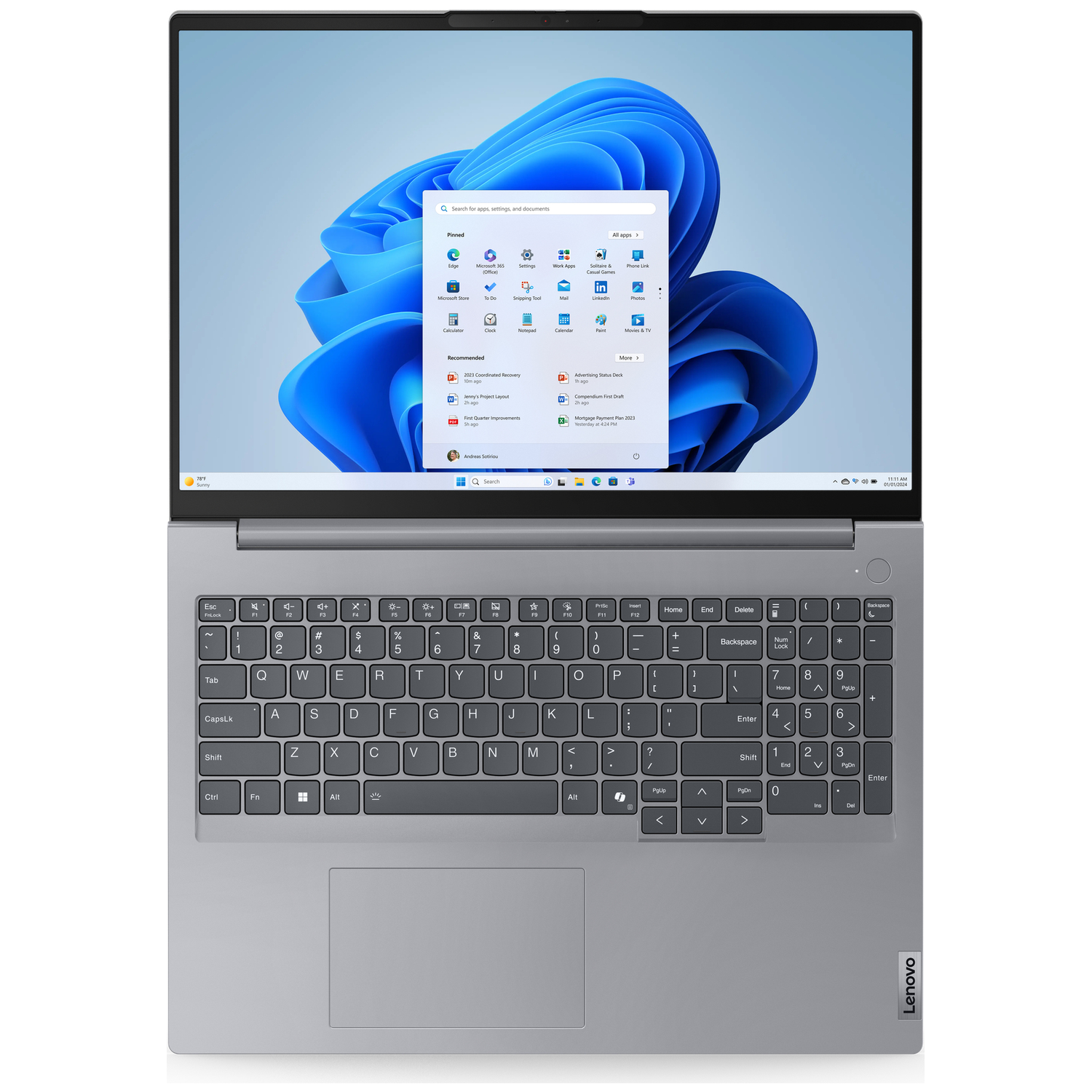 Gray laptop displaying Windows 11 Start menu. Keyboard and touchpad visible.