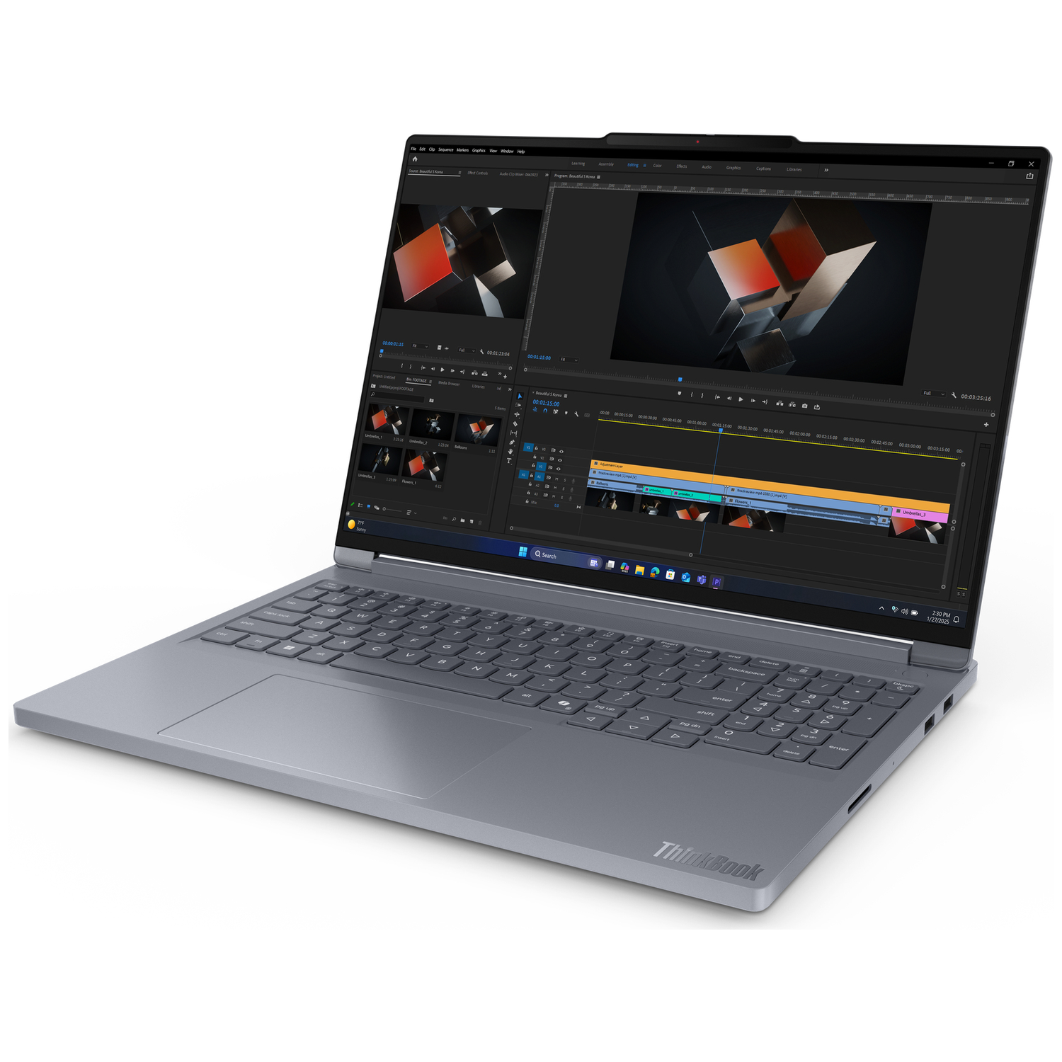 A gray ThinkBook laptop displays video editing software with timelines.