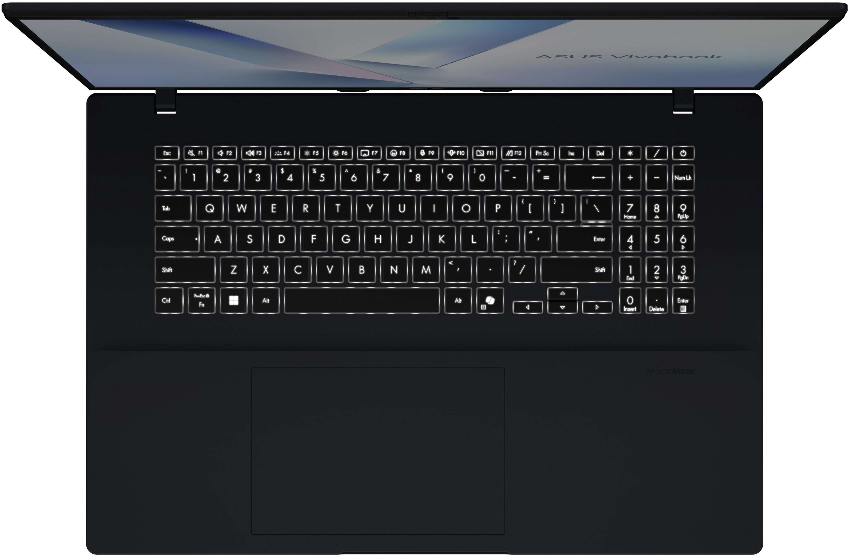 Egy fekete ASUS Vivobook laptop háttérvilágítású billentyűzettel és numerikus paddal.